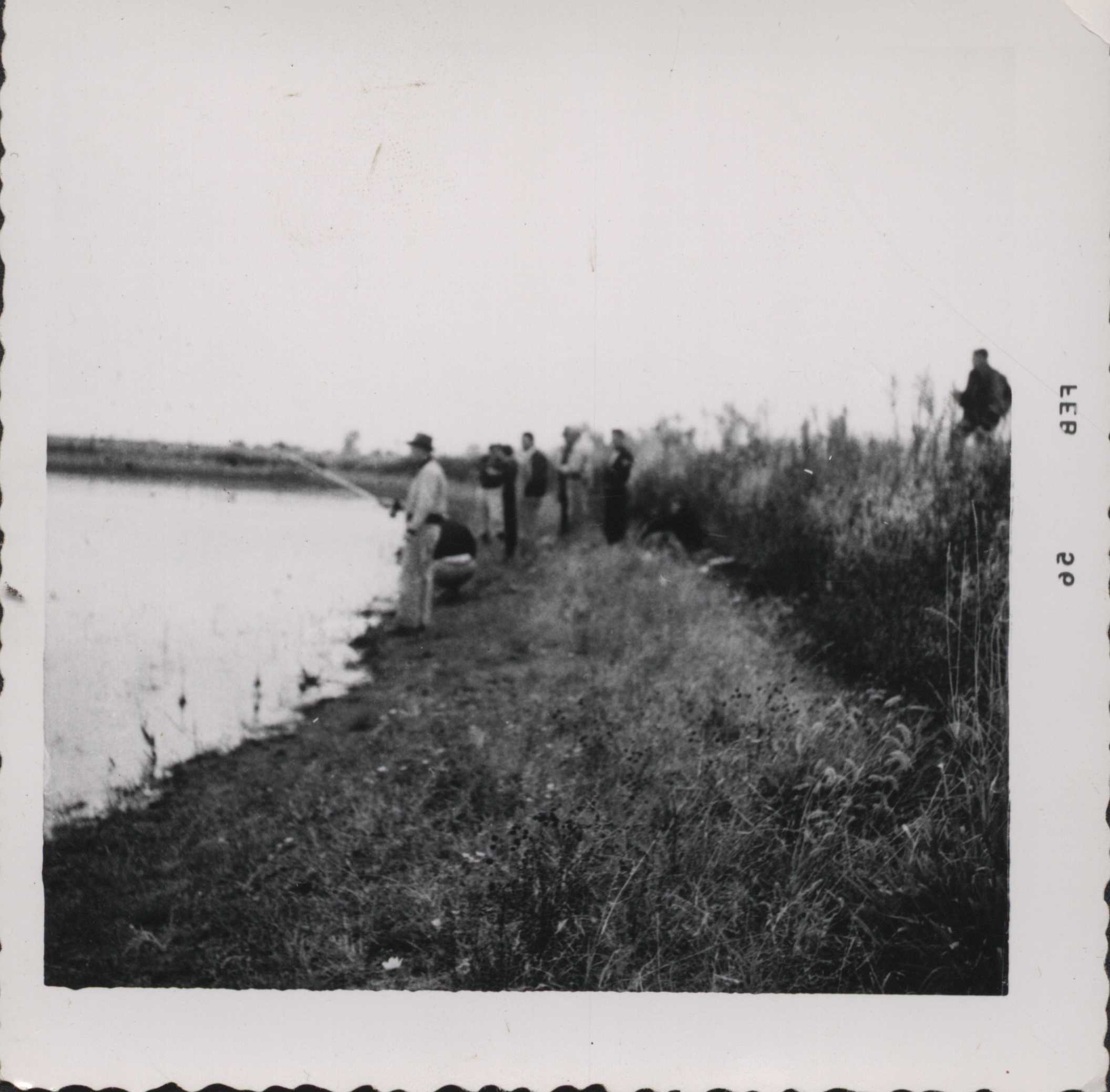 Fishing on the farm pond.