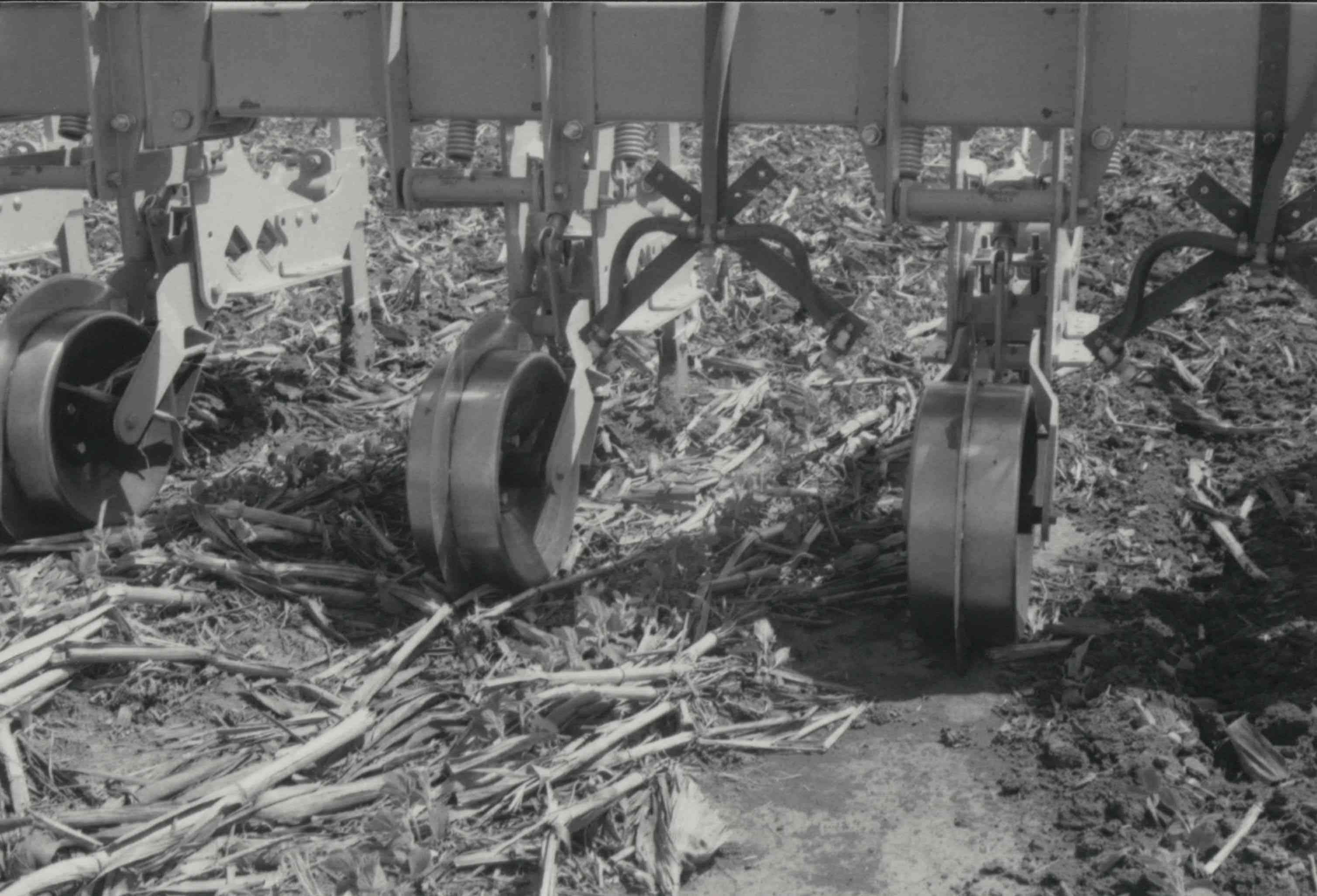 Close-up of disks on disking machine