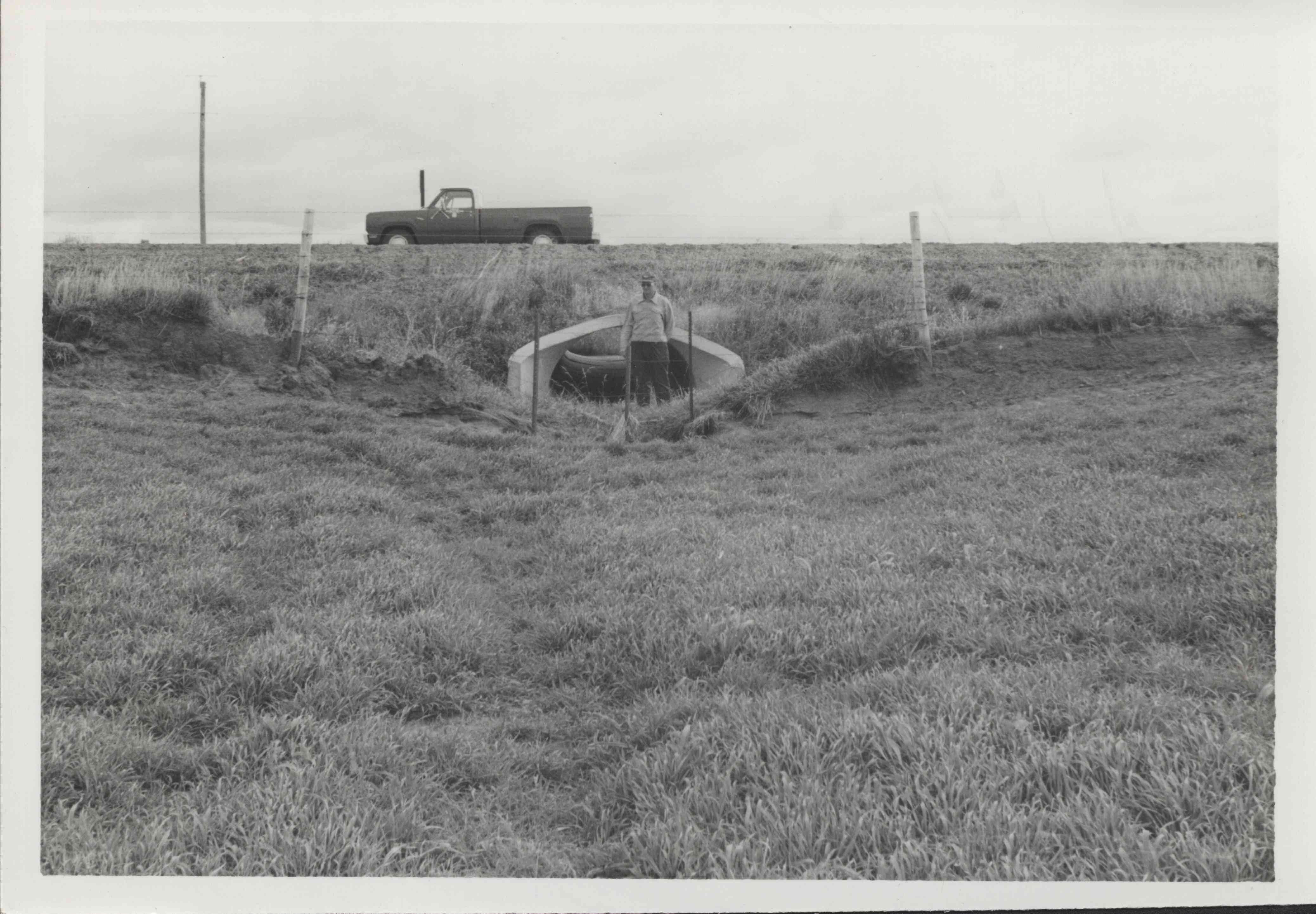 Man stands in entrance of the completed  Kilker Waterway