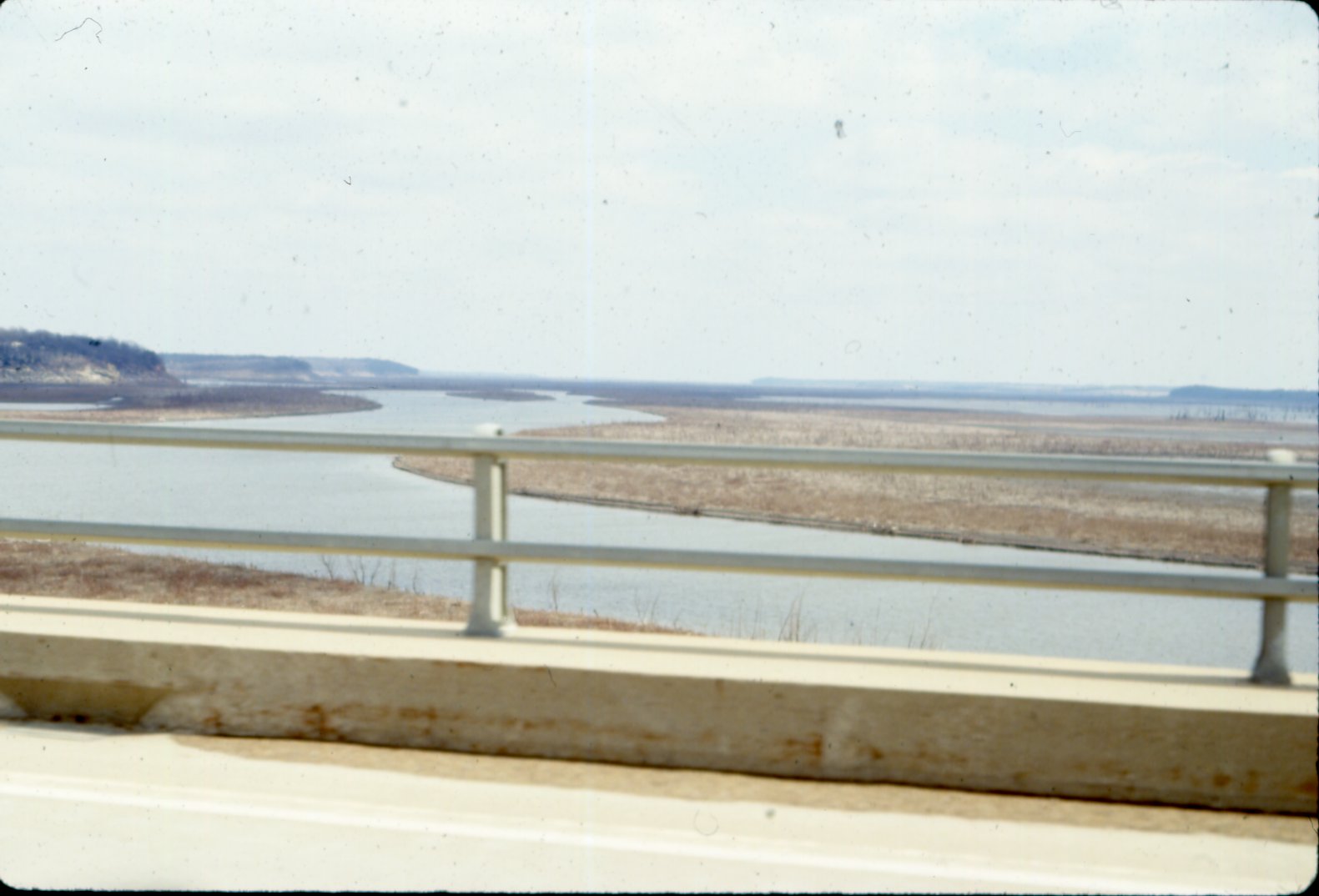 Road bridge overlooking water, 1980