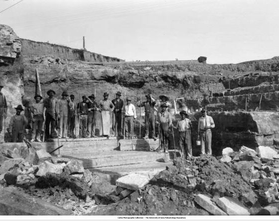 Title page; Crew of men near lower quarry beds, east of Farley, Iowa, late 1890s or early 1900s