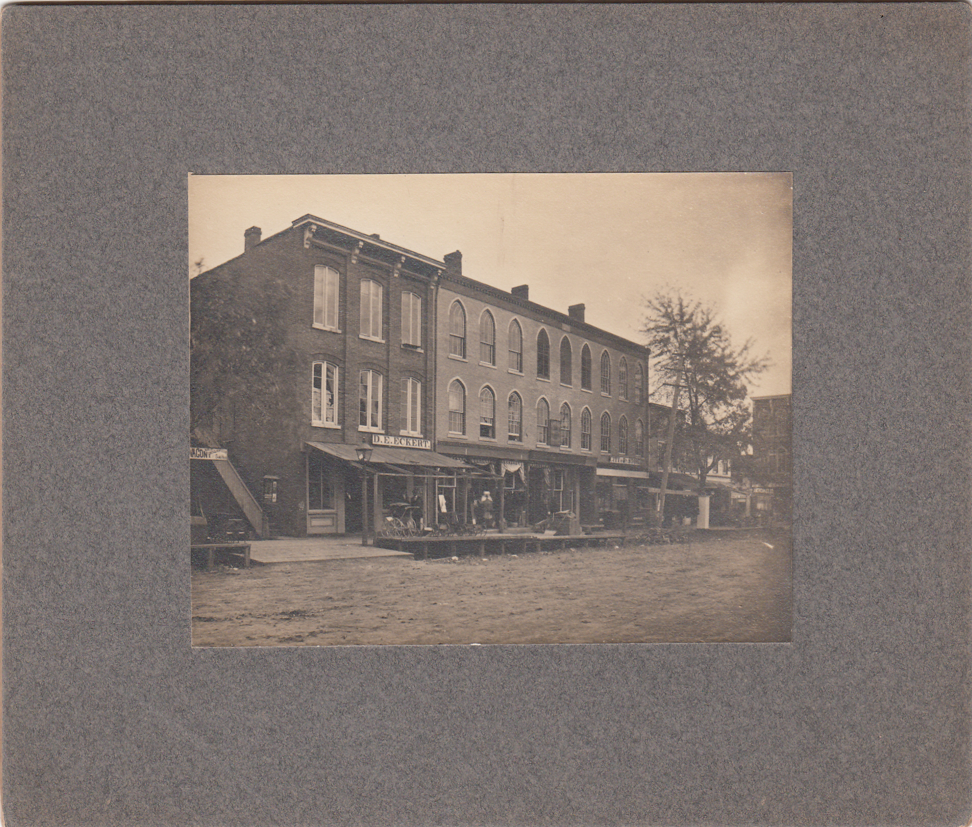0120  East side of the square in 1876 showing town businesses