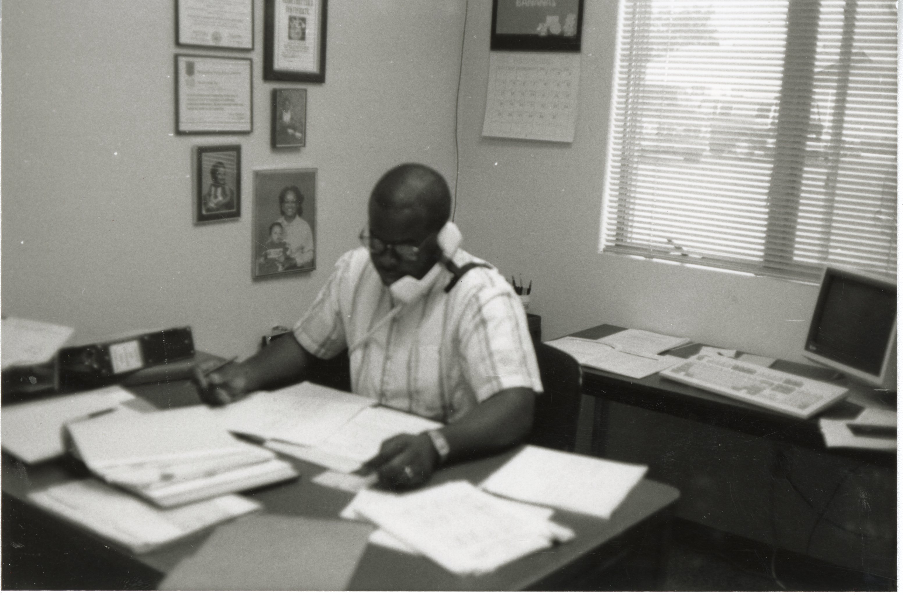 Terry Cosby, district conservationist, works at his desk
