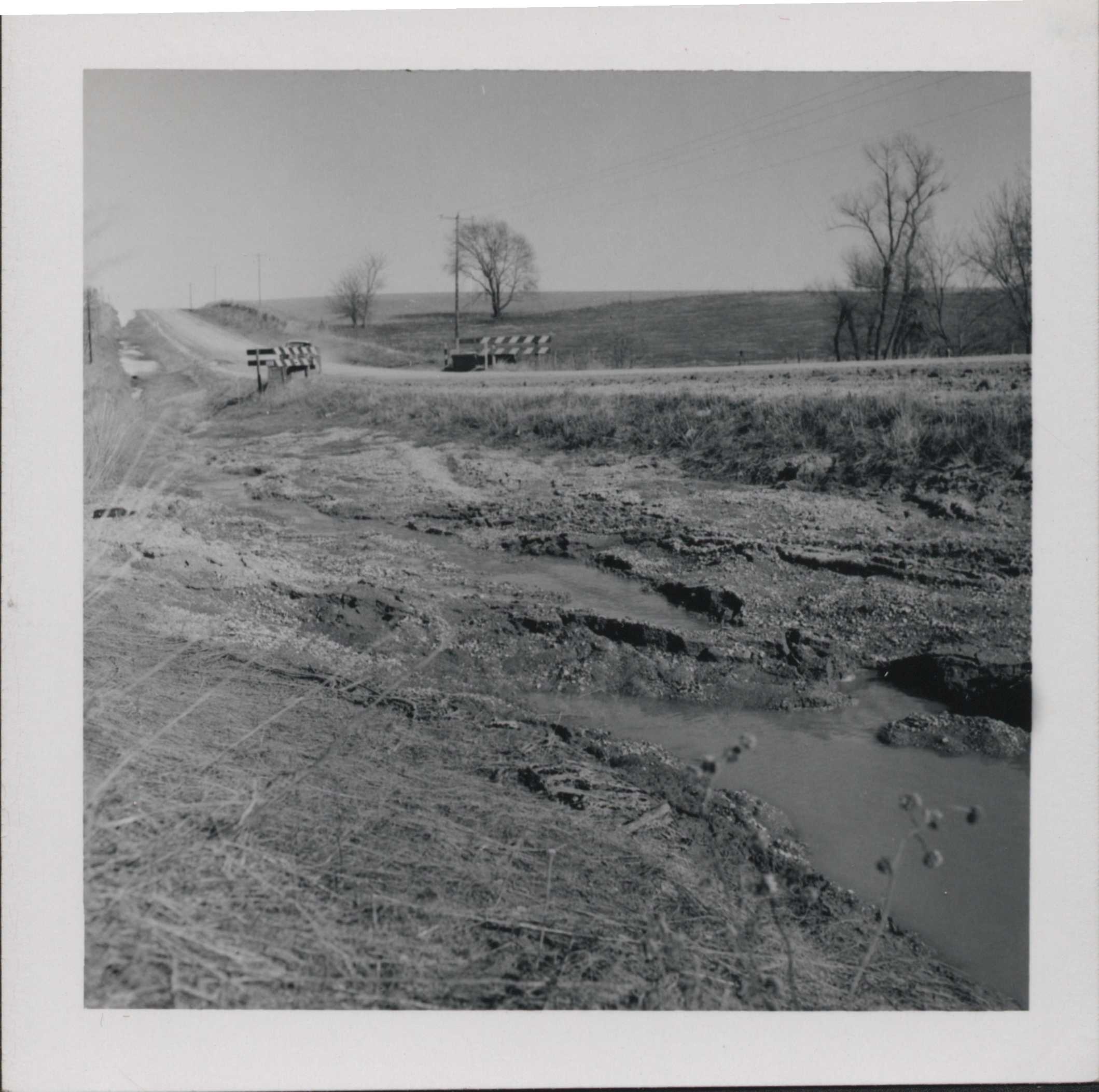 Erosion wash in the road ditch.