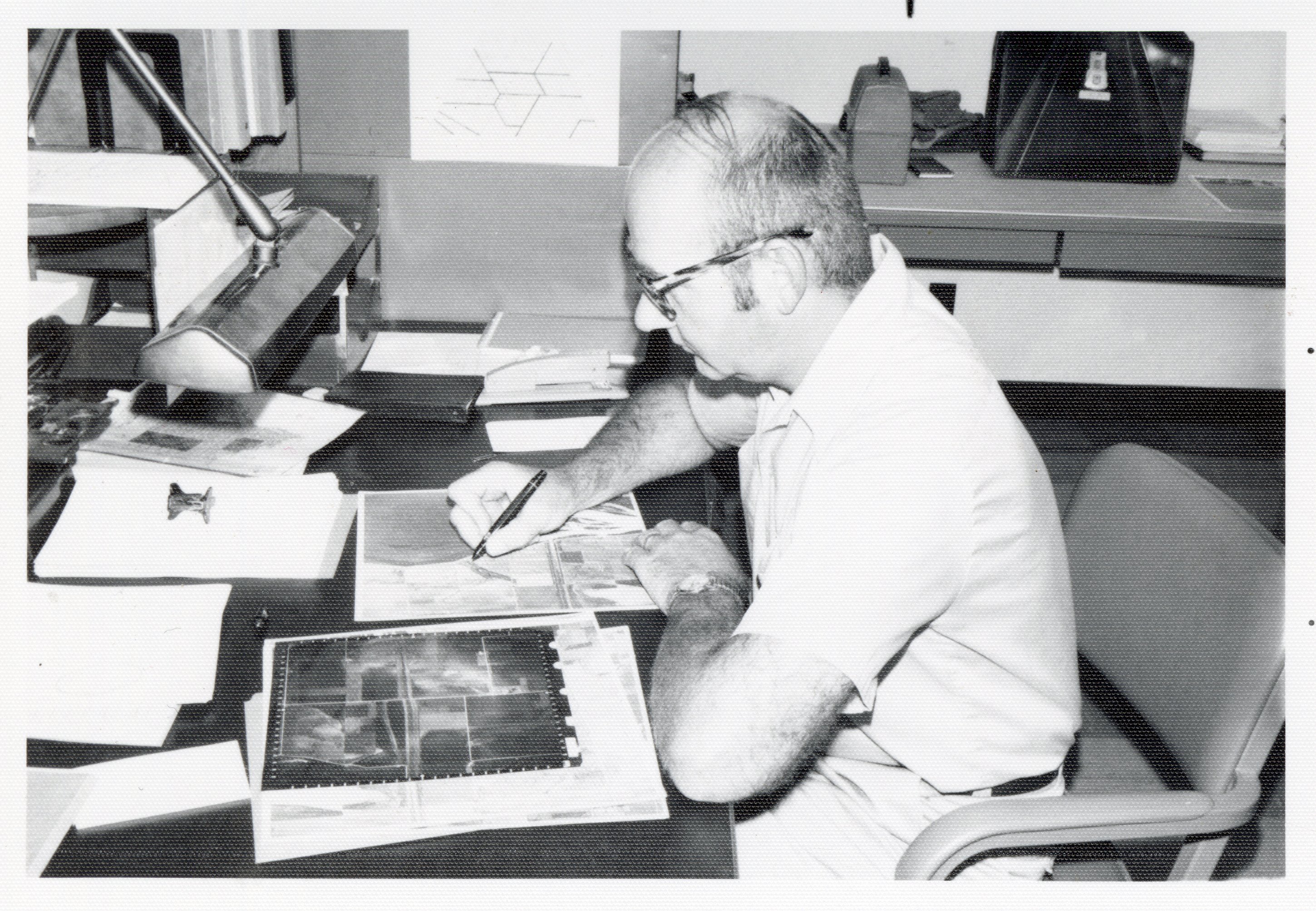 1975 Soil scientist Mel_Brown  looks at aerial photos