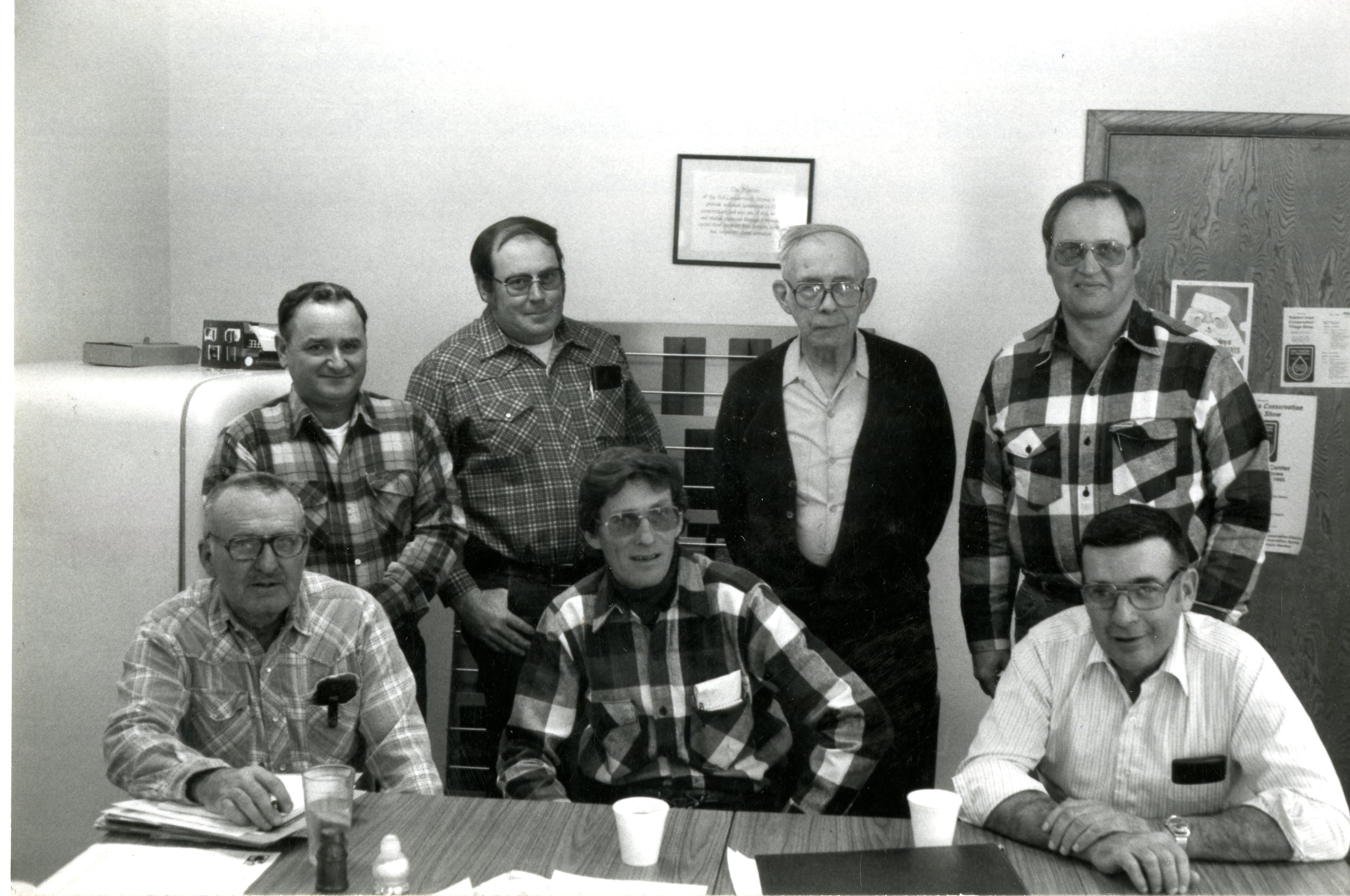 1984 - Seven Soil Conservation District Commissioners and Assistants Pose for Photograph in December 1984
