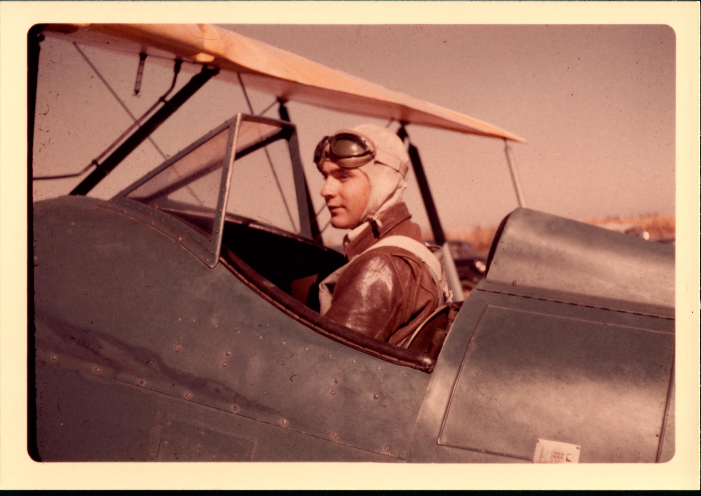 0047_Paul Metcalf in Plane