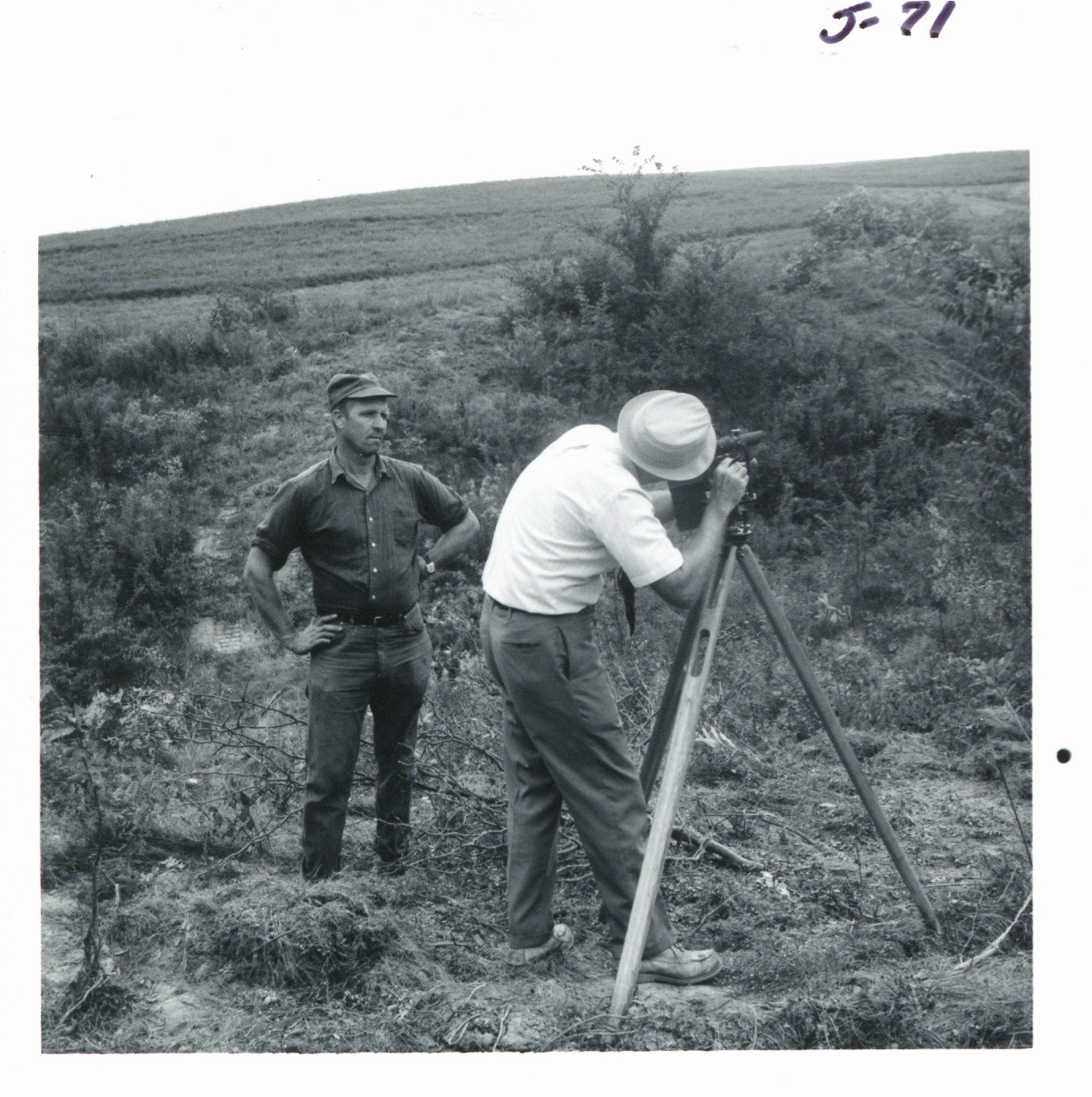Fouken surveying Ray Stillmunkes gully area