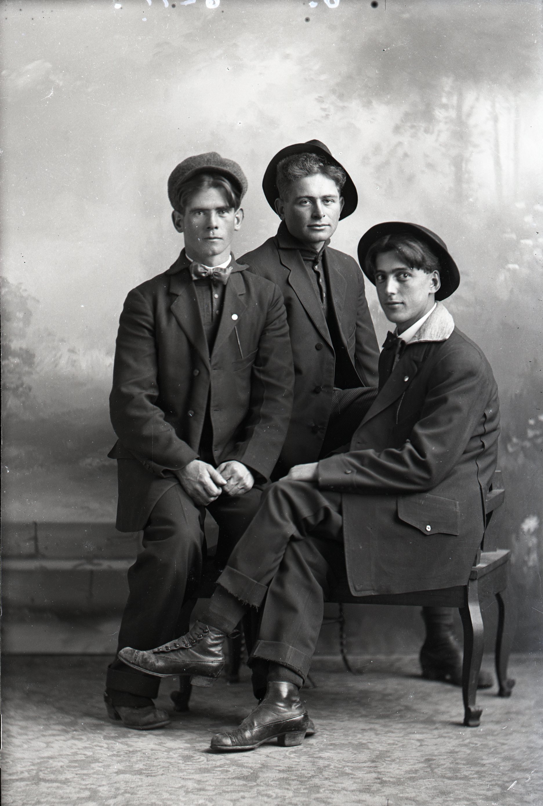 Three men seated