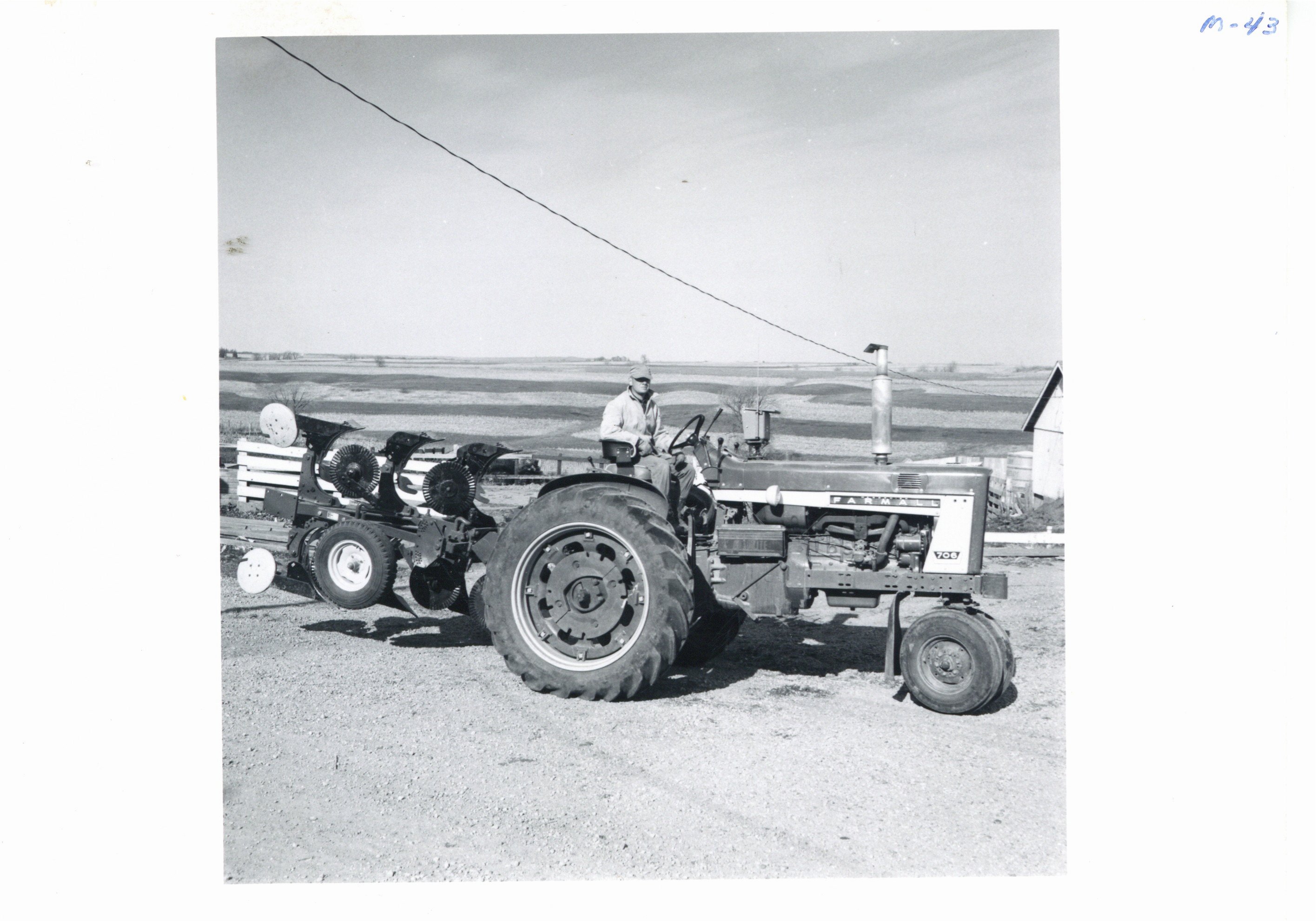 Donald Gray driving new 2-way plow, 1966