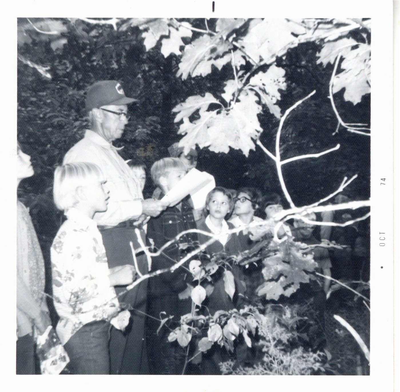 Harold Sullivan conducting an outdoor classroom with Preston fifth graders, 1969