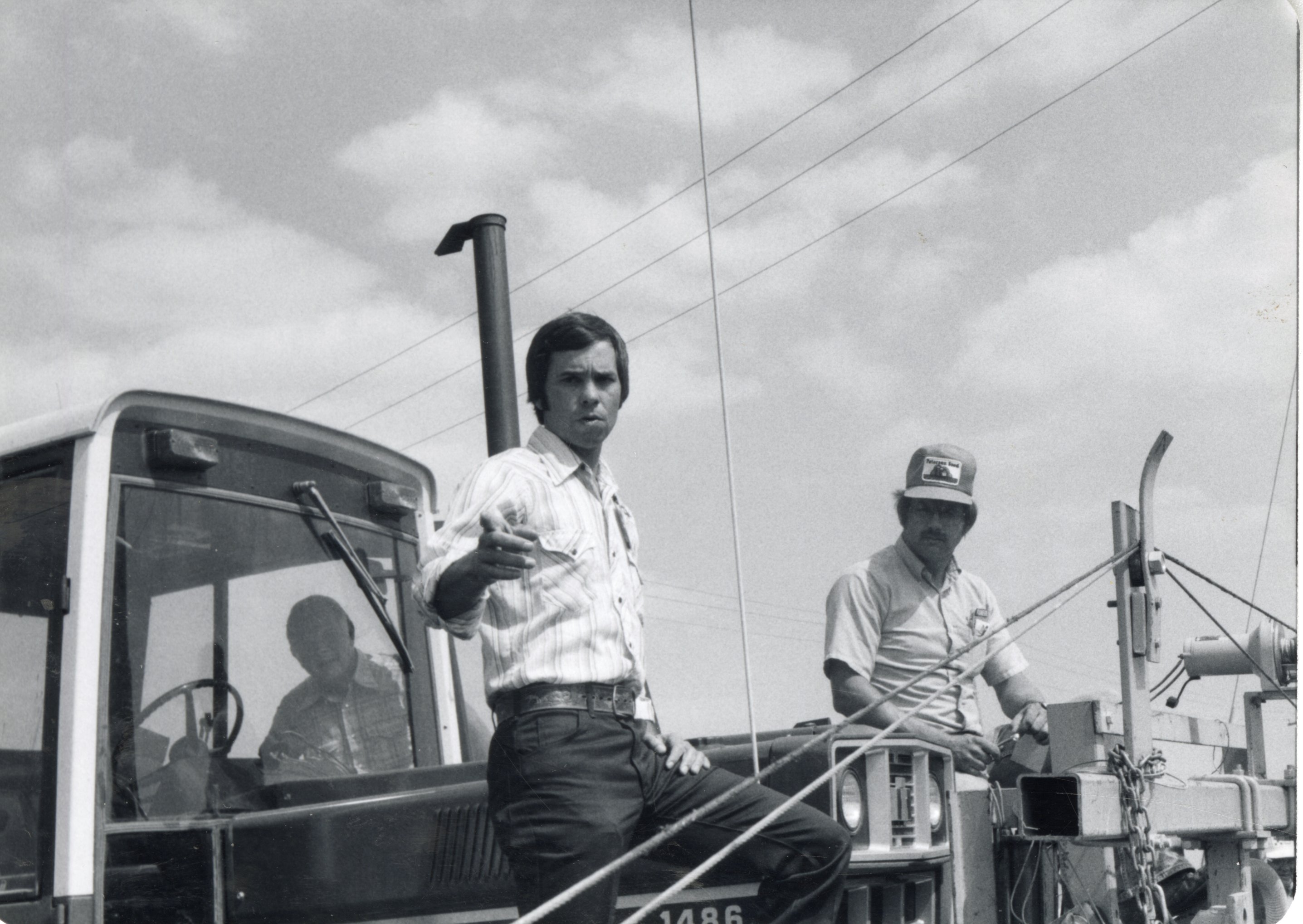 1980's Howard Bright and two others by truck