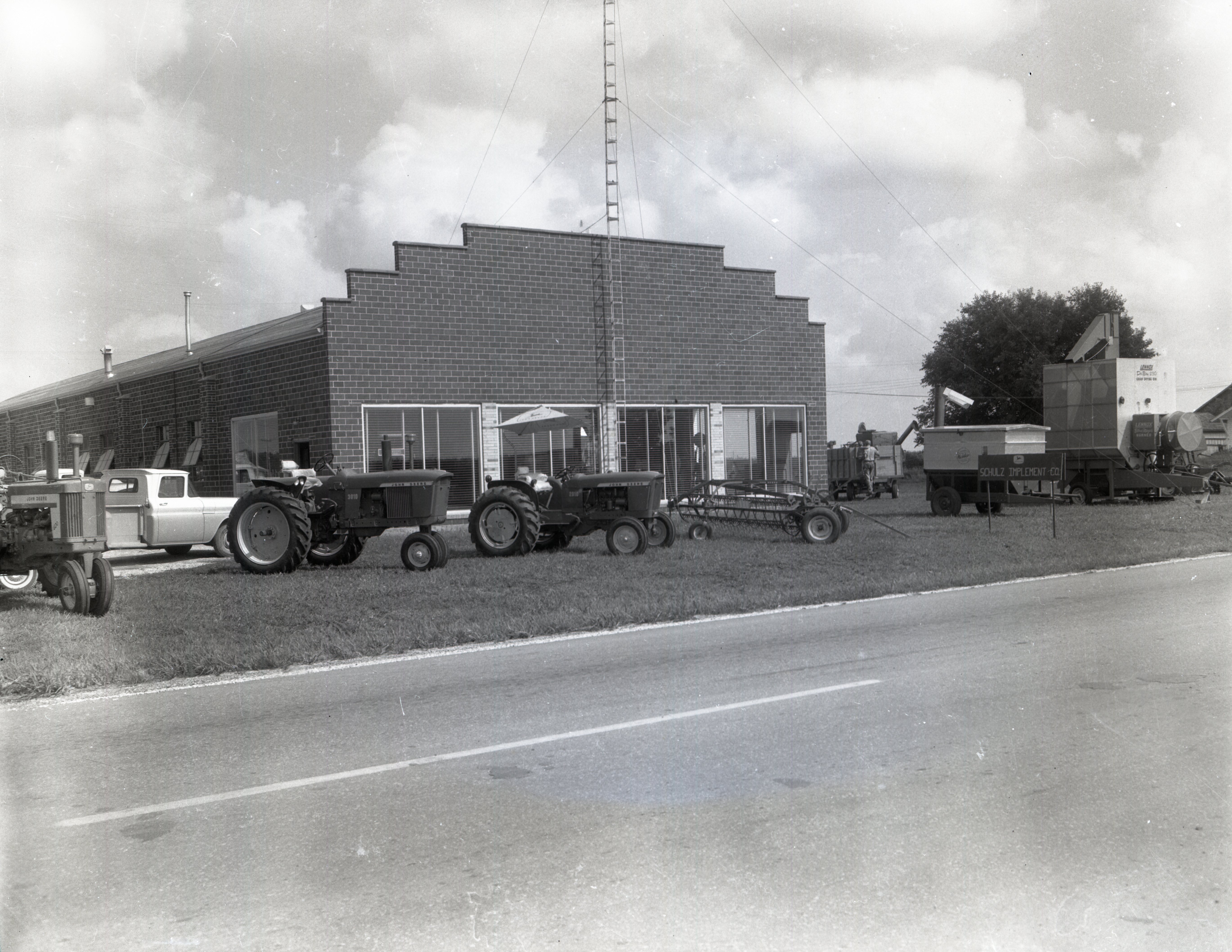 Schulz Implement Company with Farm Machinery in Front