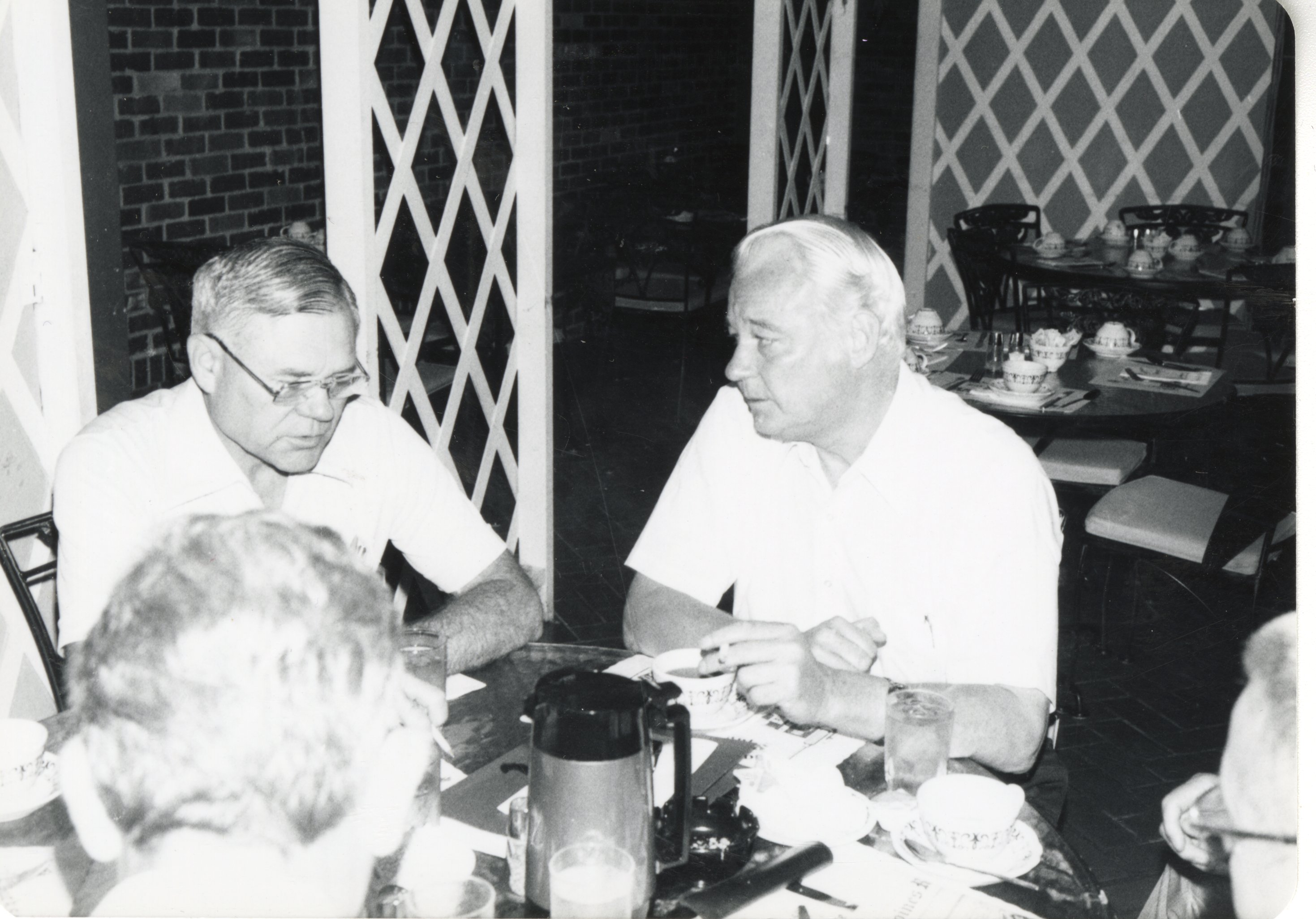 Bob Sogaard on left and three others at a table