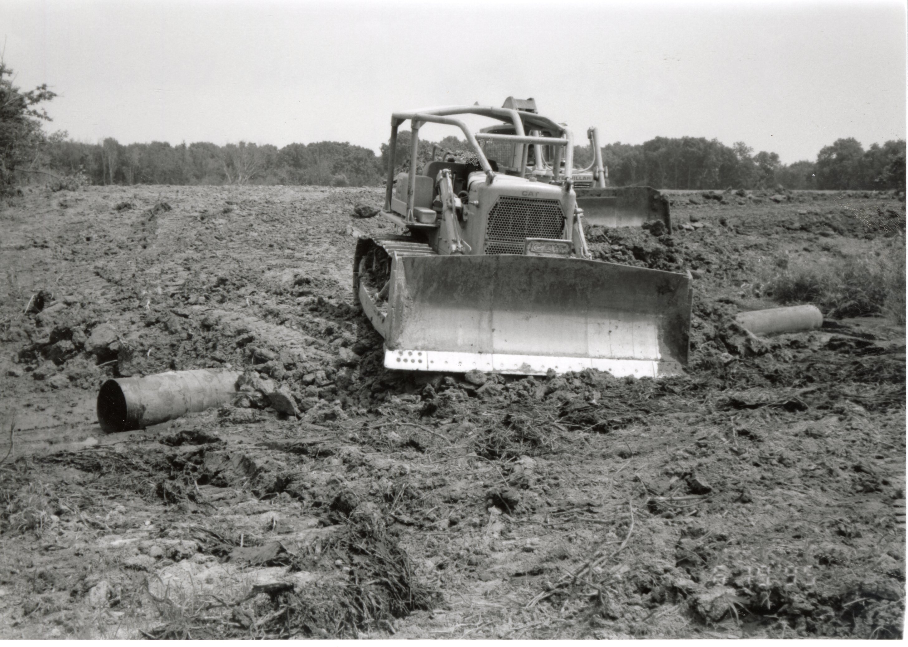 1995  Construction of Ditch Crossing with bulldozer and pipe.