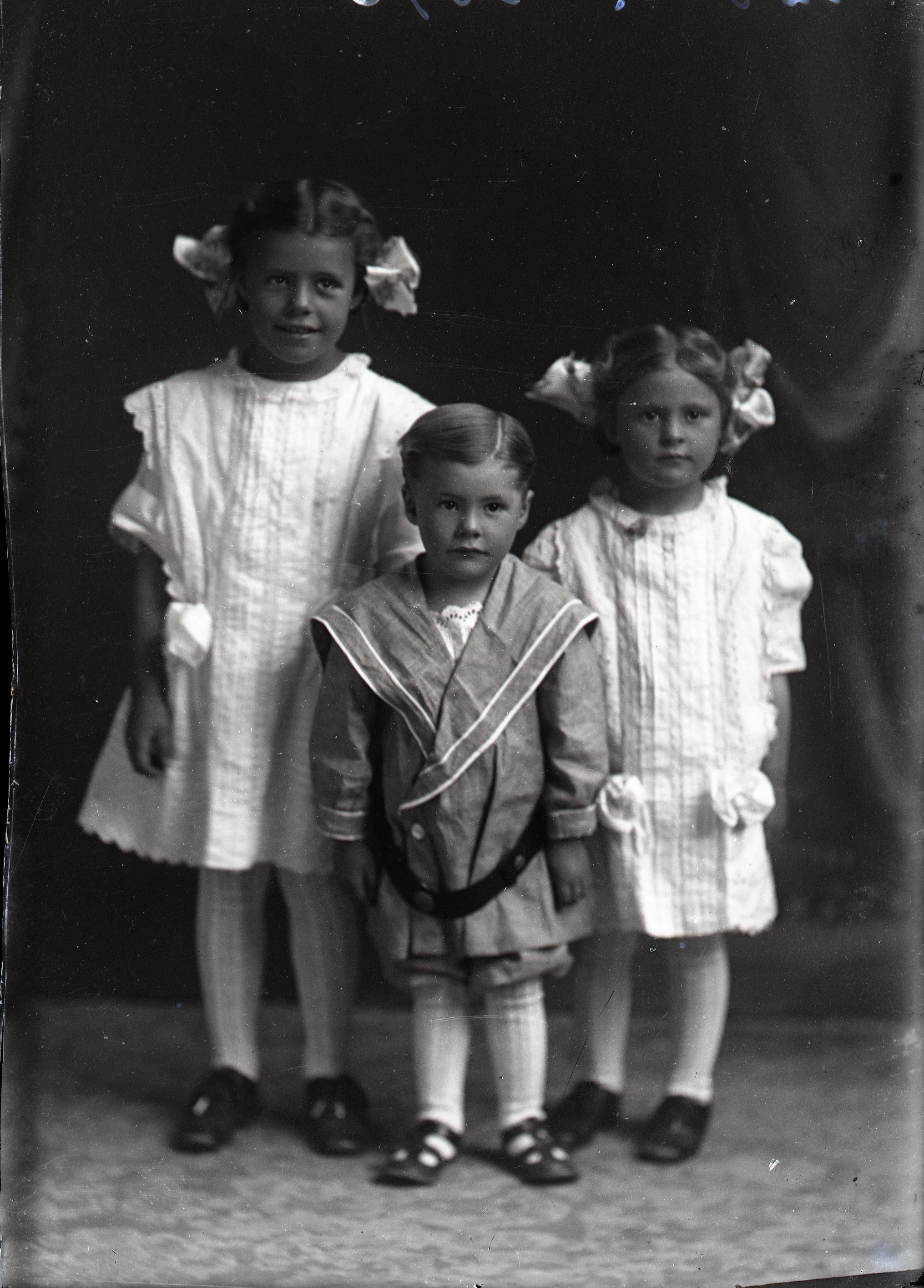 Three children standing