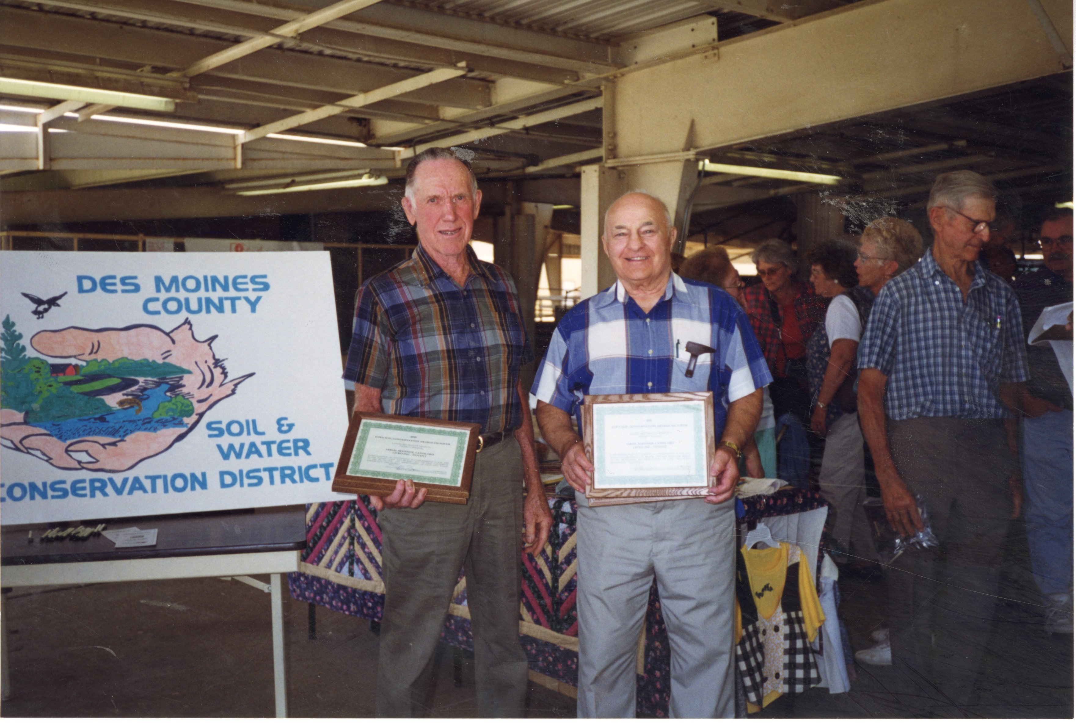 1998 Virgil Massner, Landlord/Tenant Award winner, stands next to Steve Licko on the right