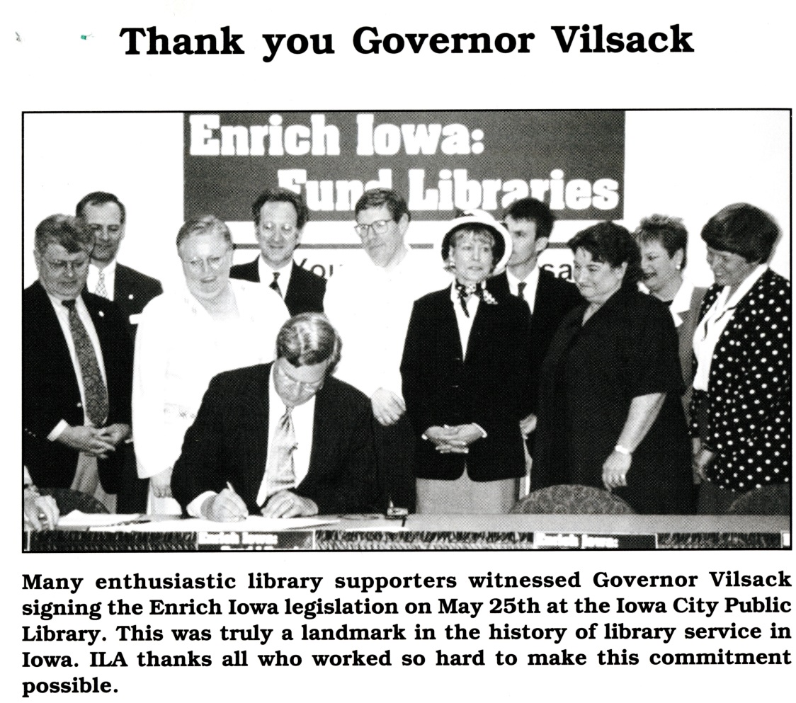 Governor Tom Vilsack signs Enrich Iowa legislation.
