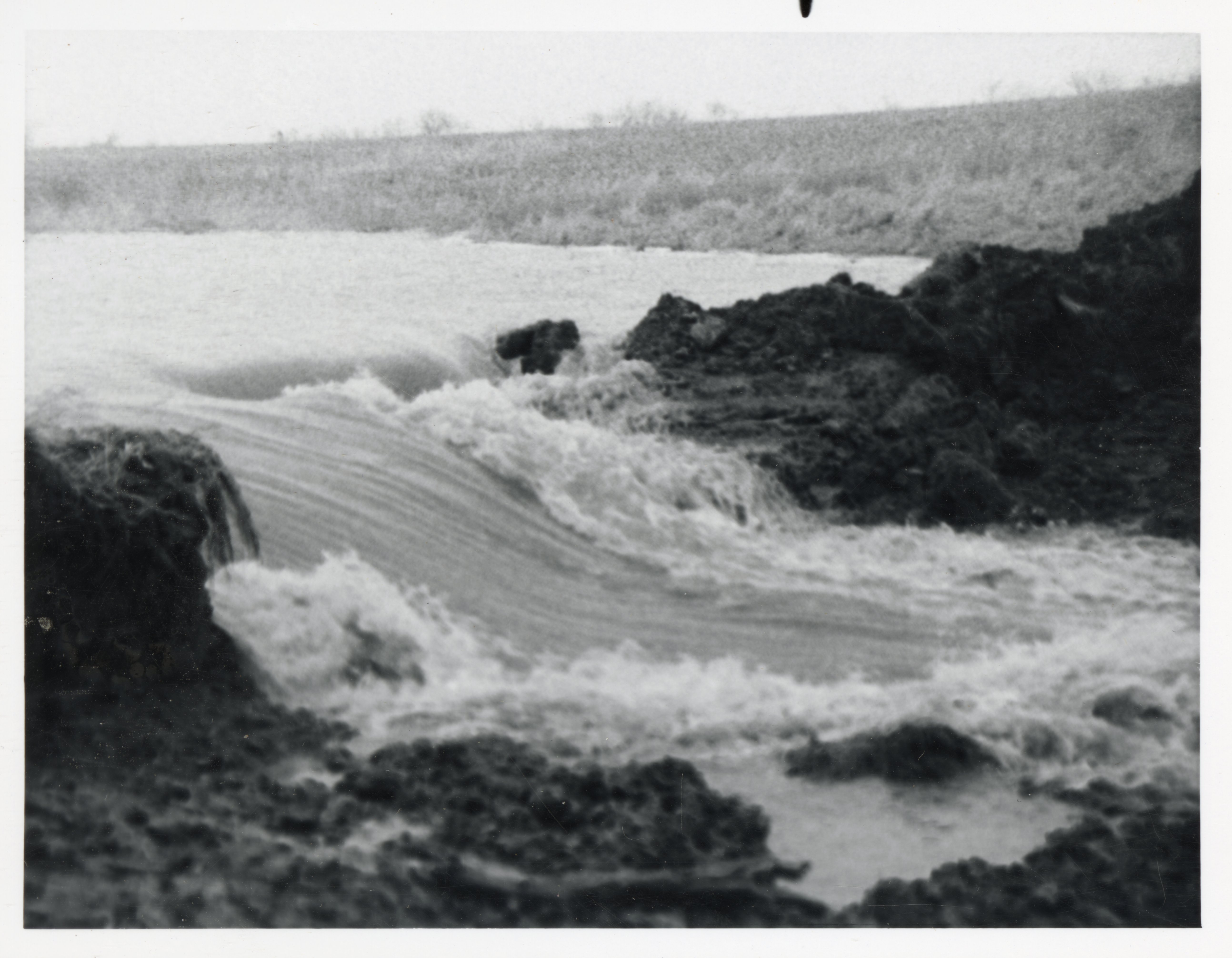 Rushing Water From Flood Causing Erosion