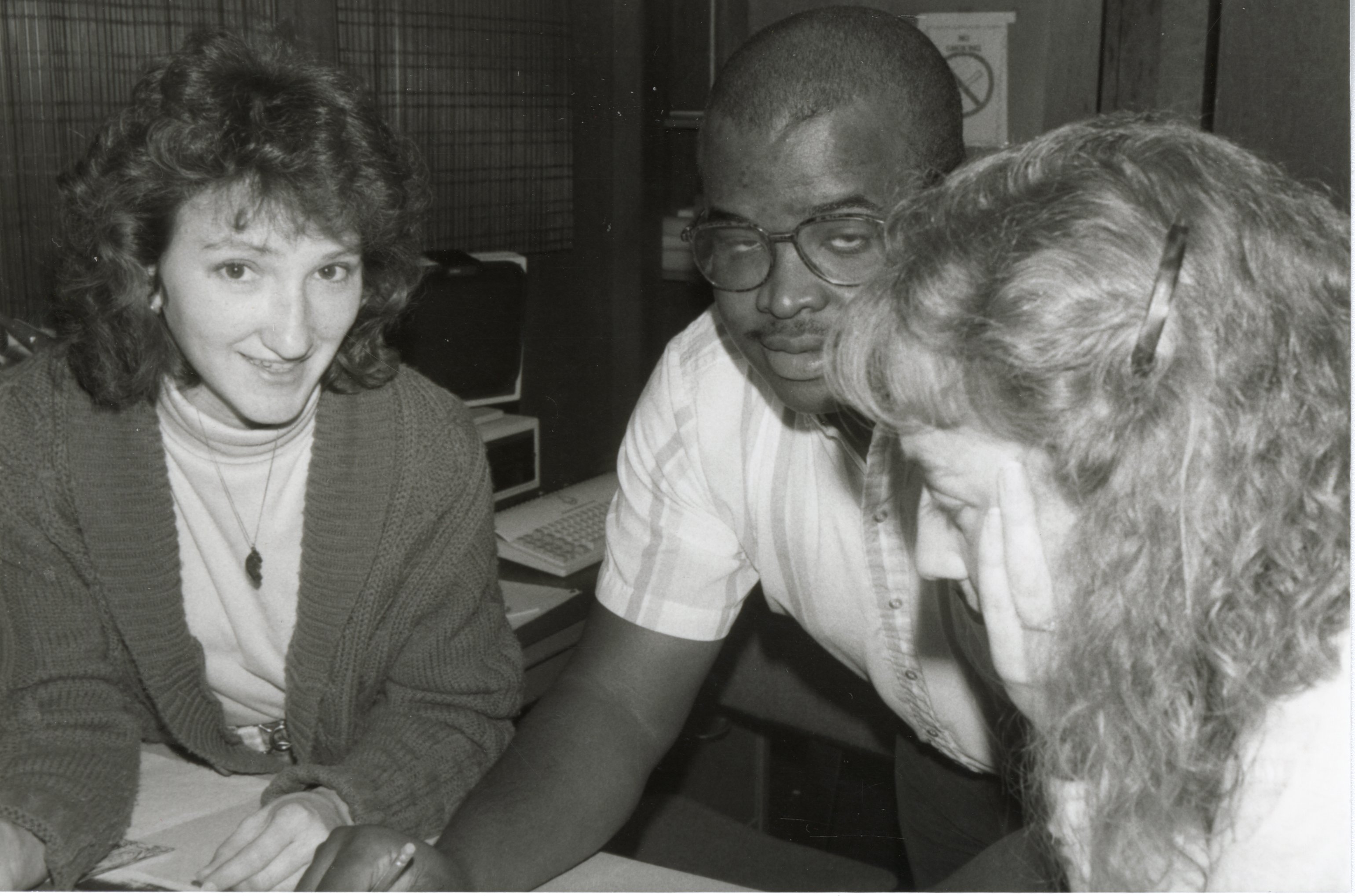 1988  Kathy Baughman, Terry Cosby, and Lisa Neidermayer work on a project for the Des Moines County Soil and Water Conservation District