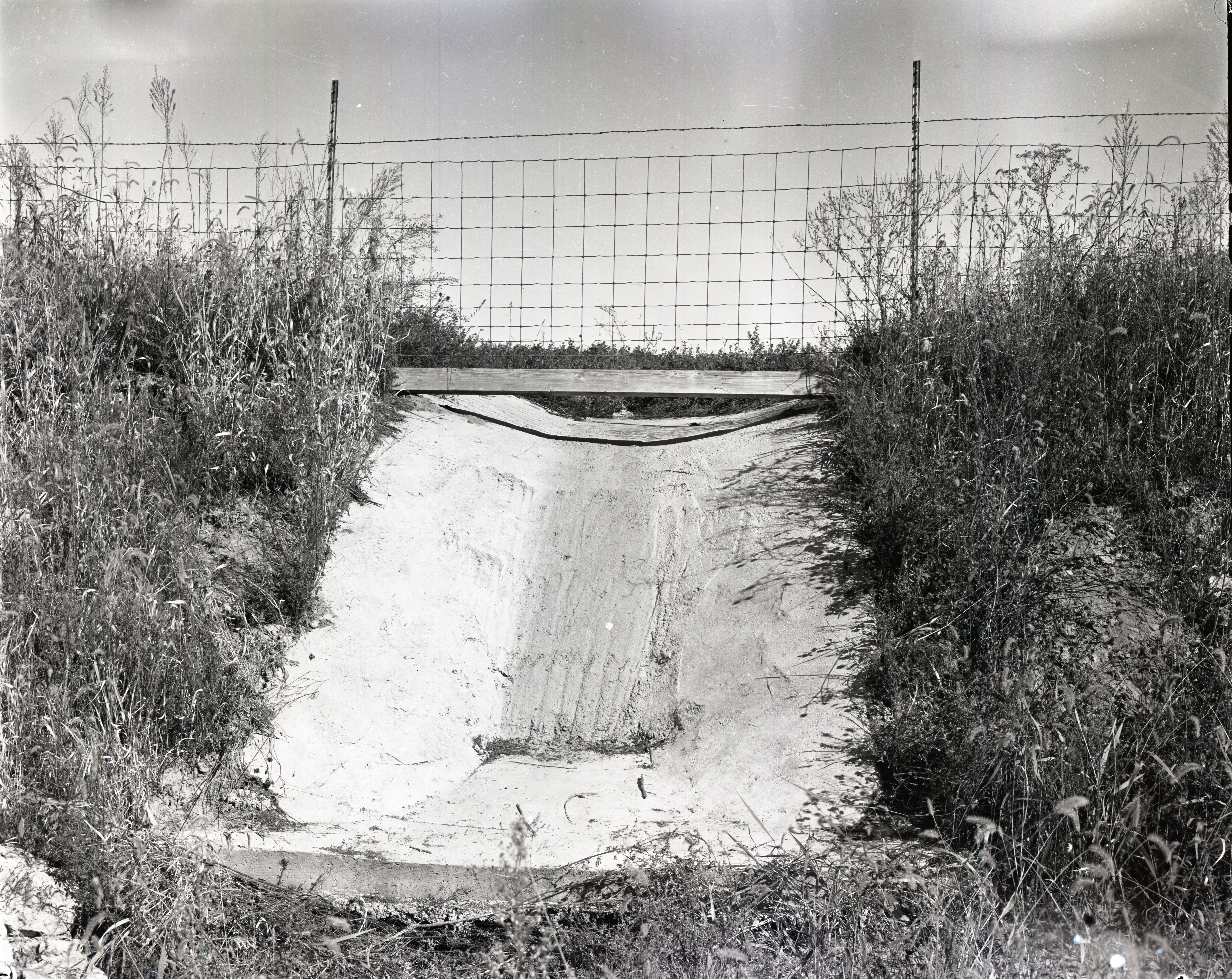 Cement water runoff structure in field