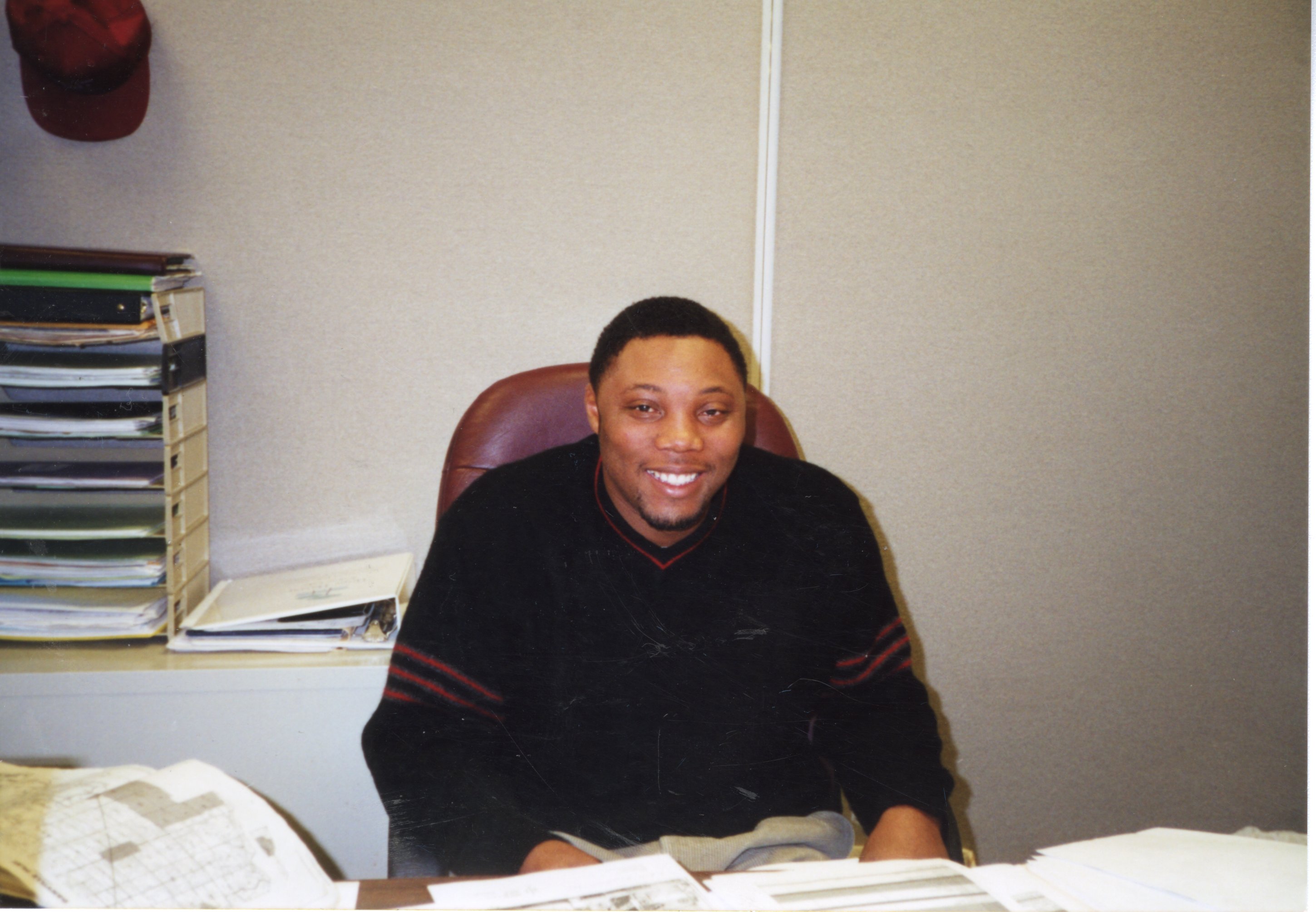 2001  NRCS (Natural Resources Conservation Service) District Conservationist Terrance Rudolph sits in his  office