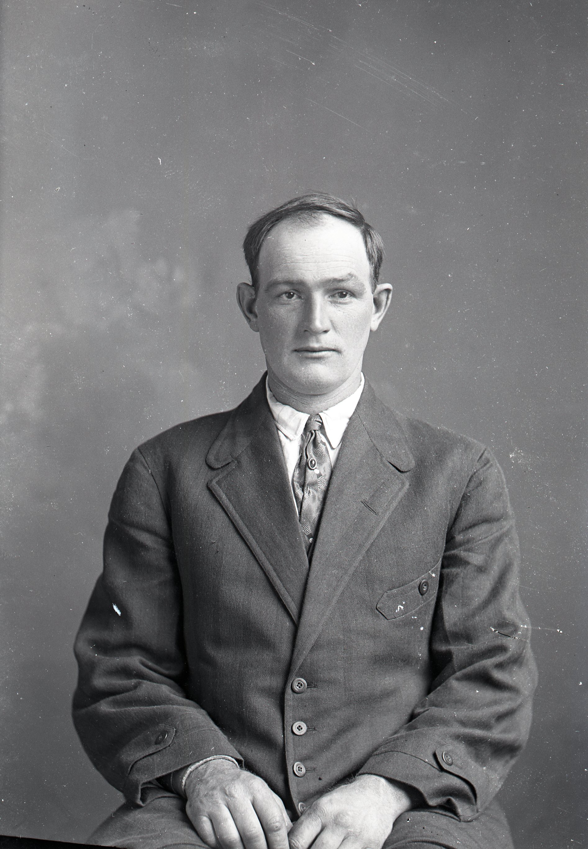 Man, seated