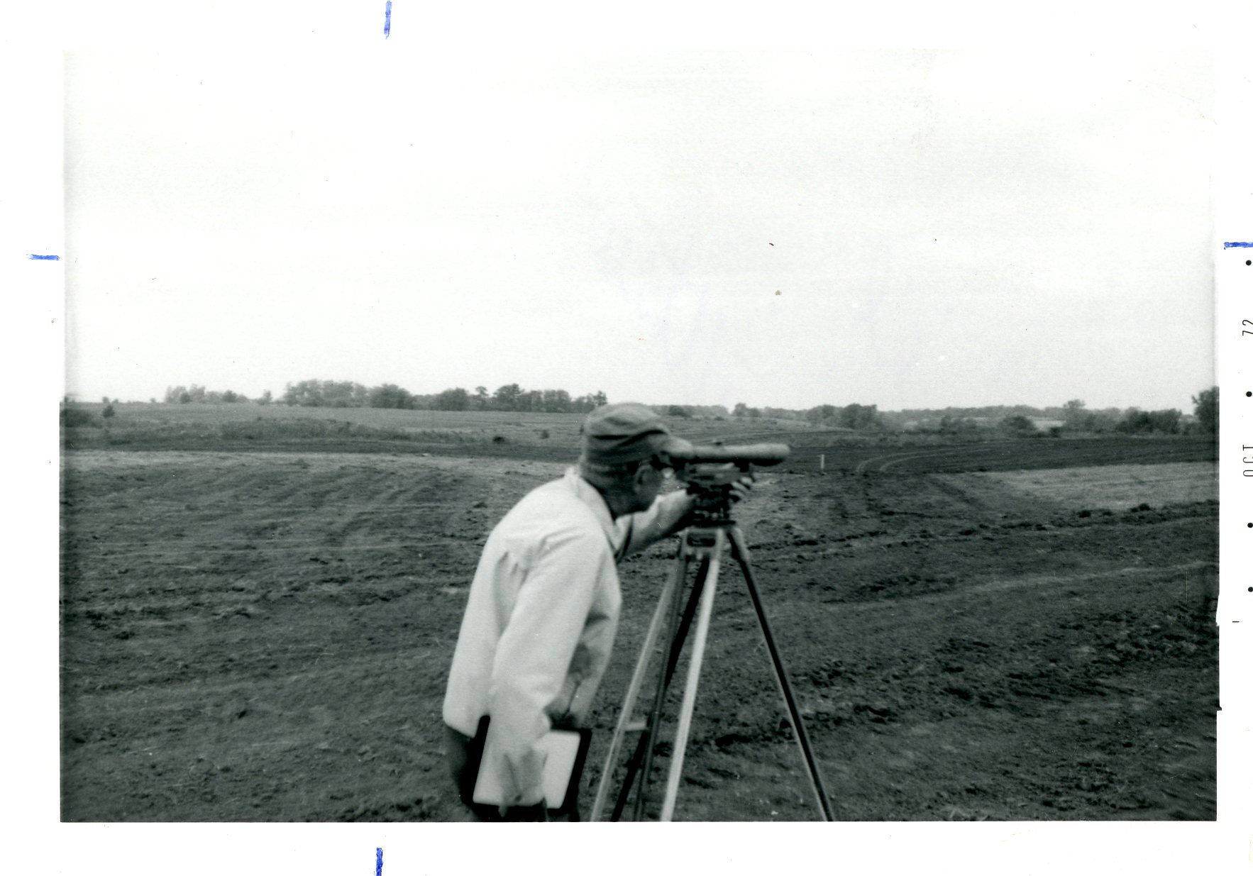 Surveyor Taking Field Measurements, 1972