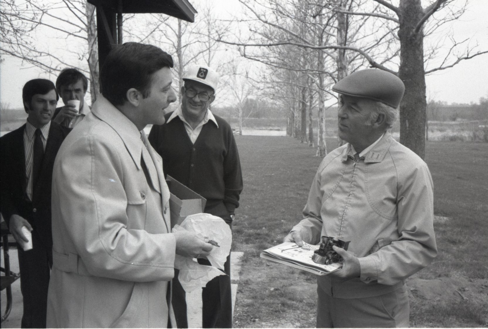 1980 Norman Berg meets with others
