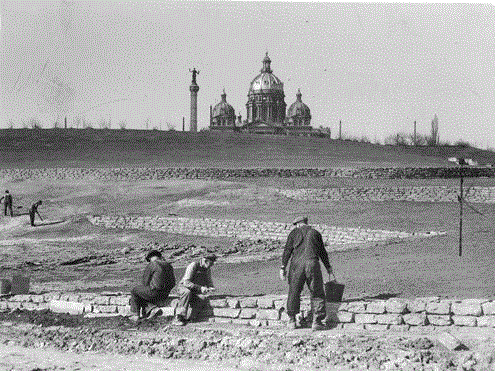 Men work on the State Capitol Grounds