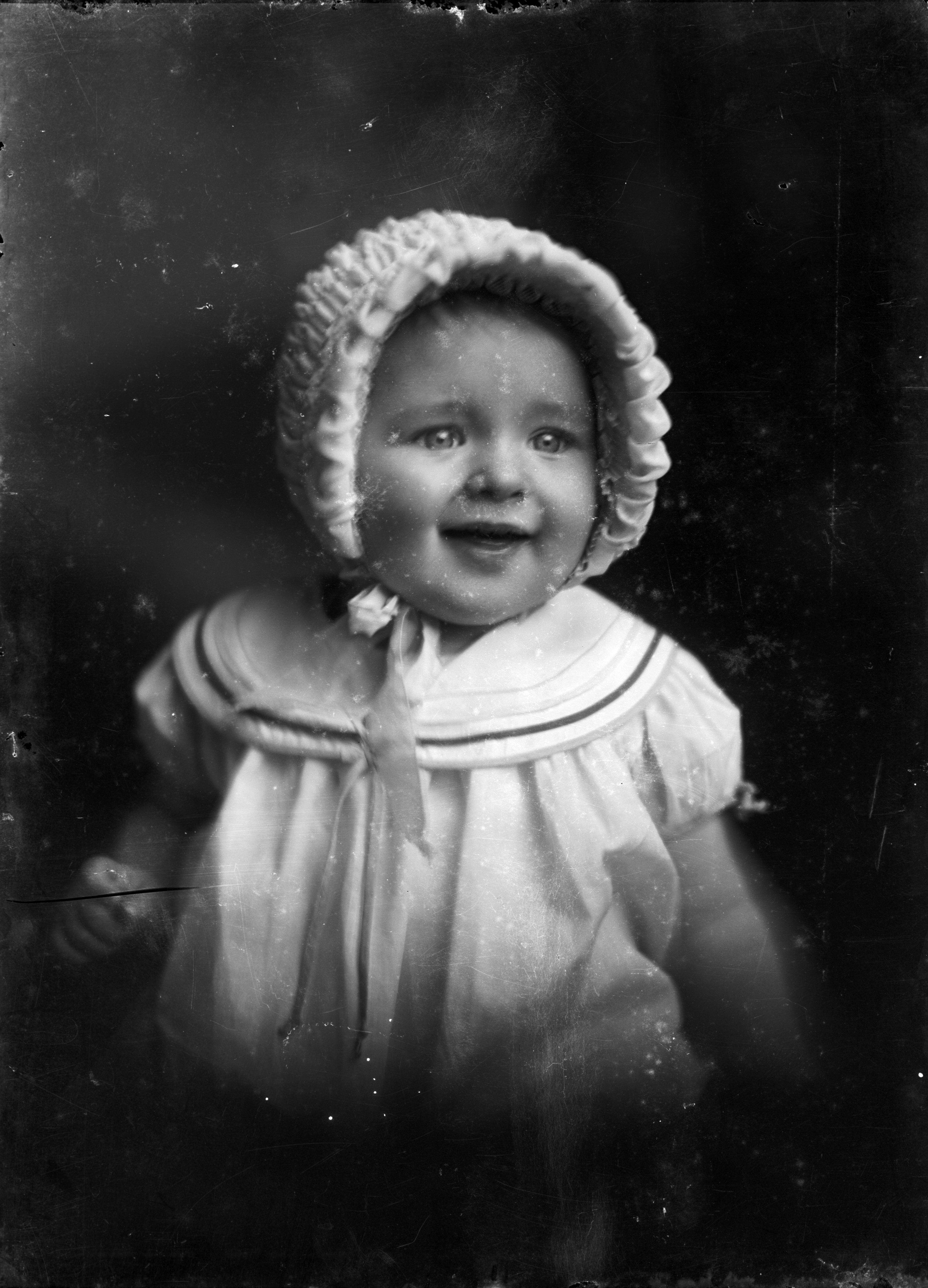 Baby in bonnet