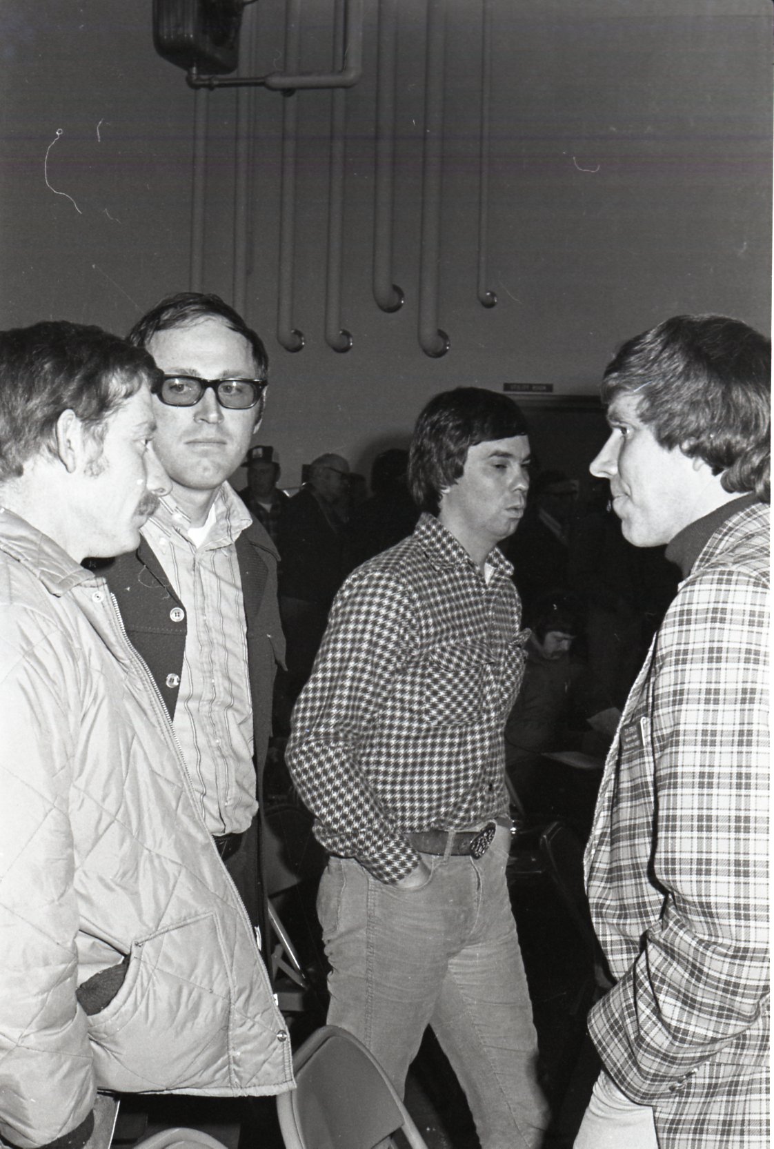 Howard Bright and other men at a meeting
