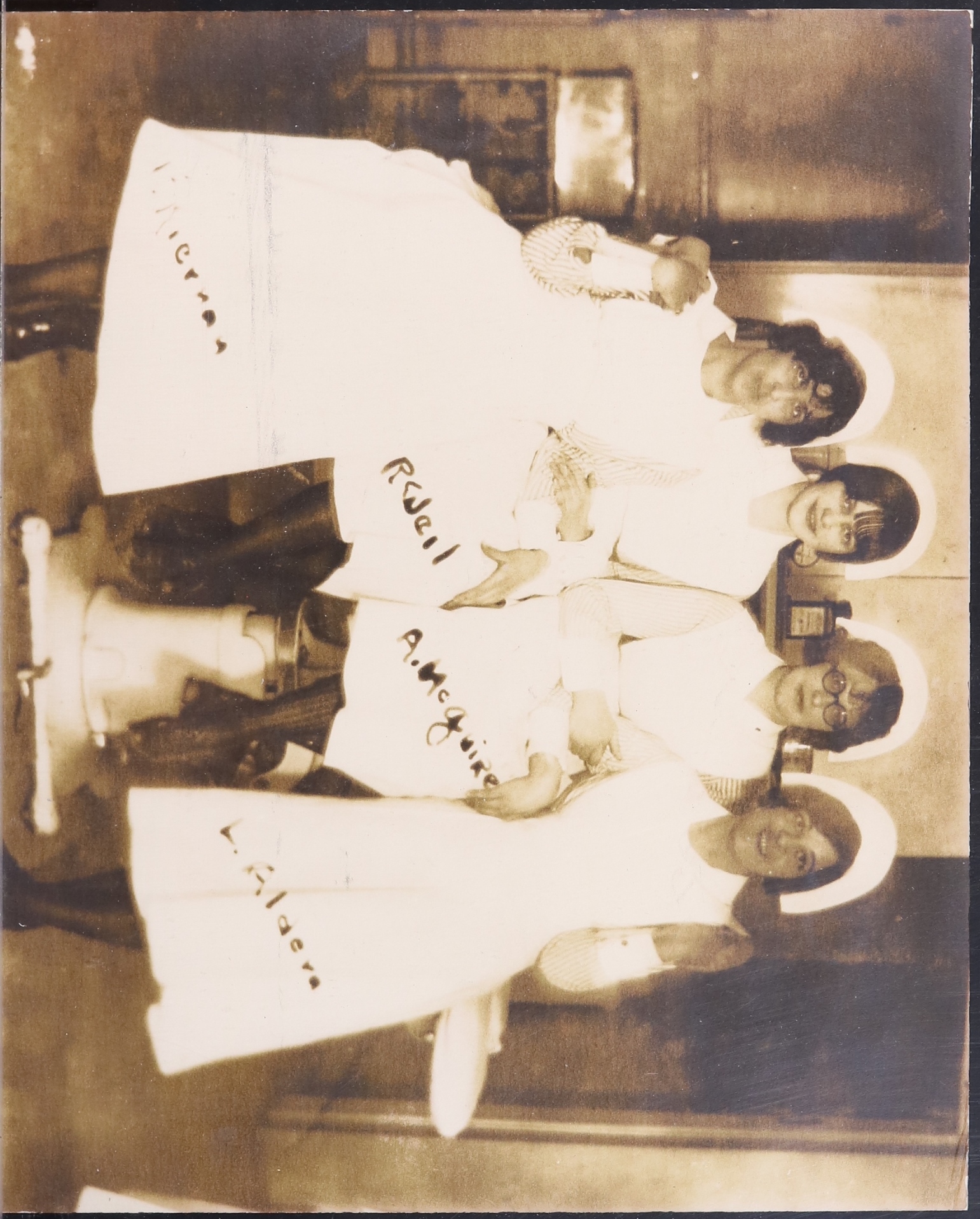 Four nursing students rom the class of 1928 pose for picture