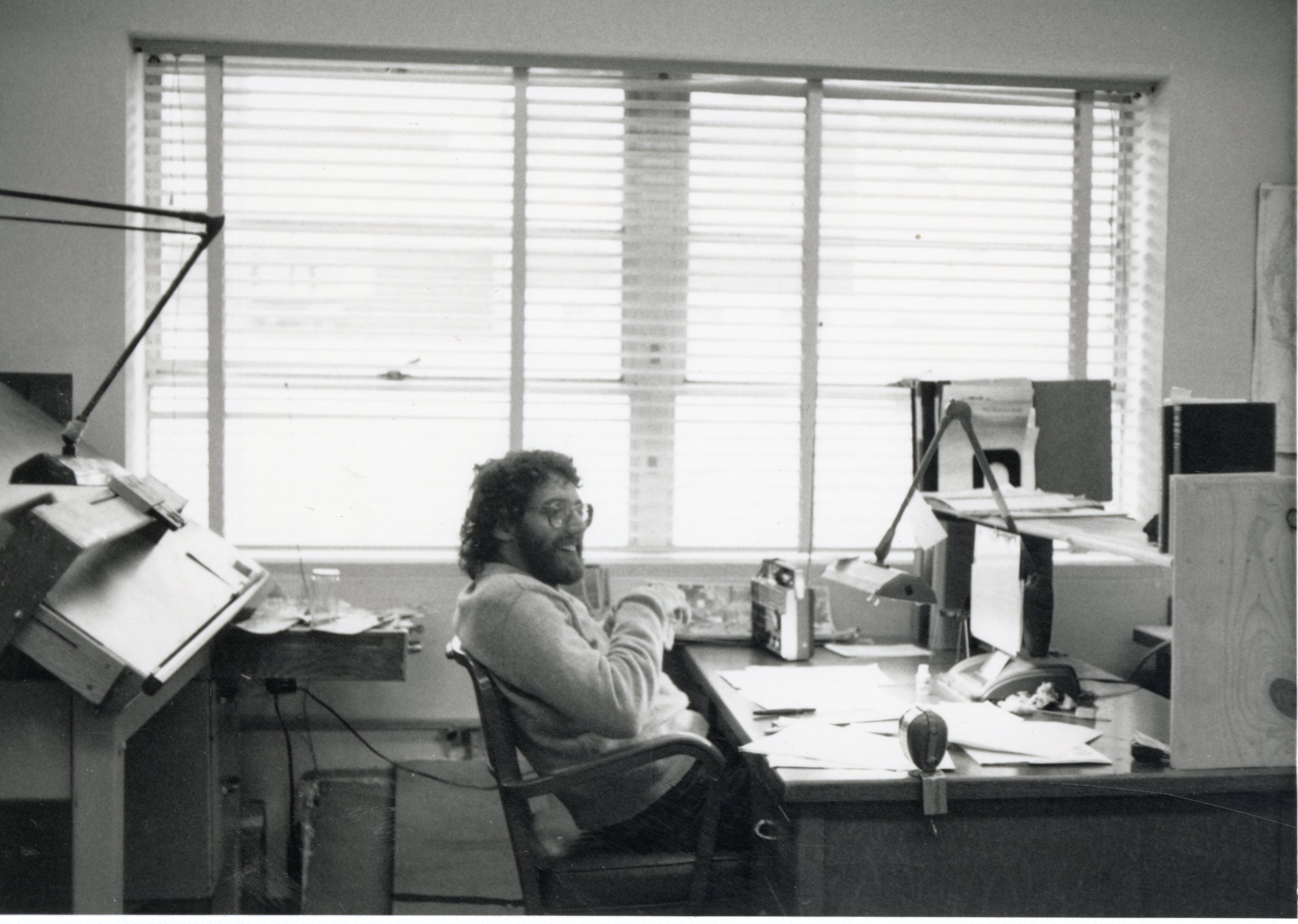 Unidentified man sits in office