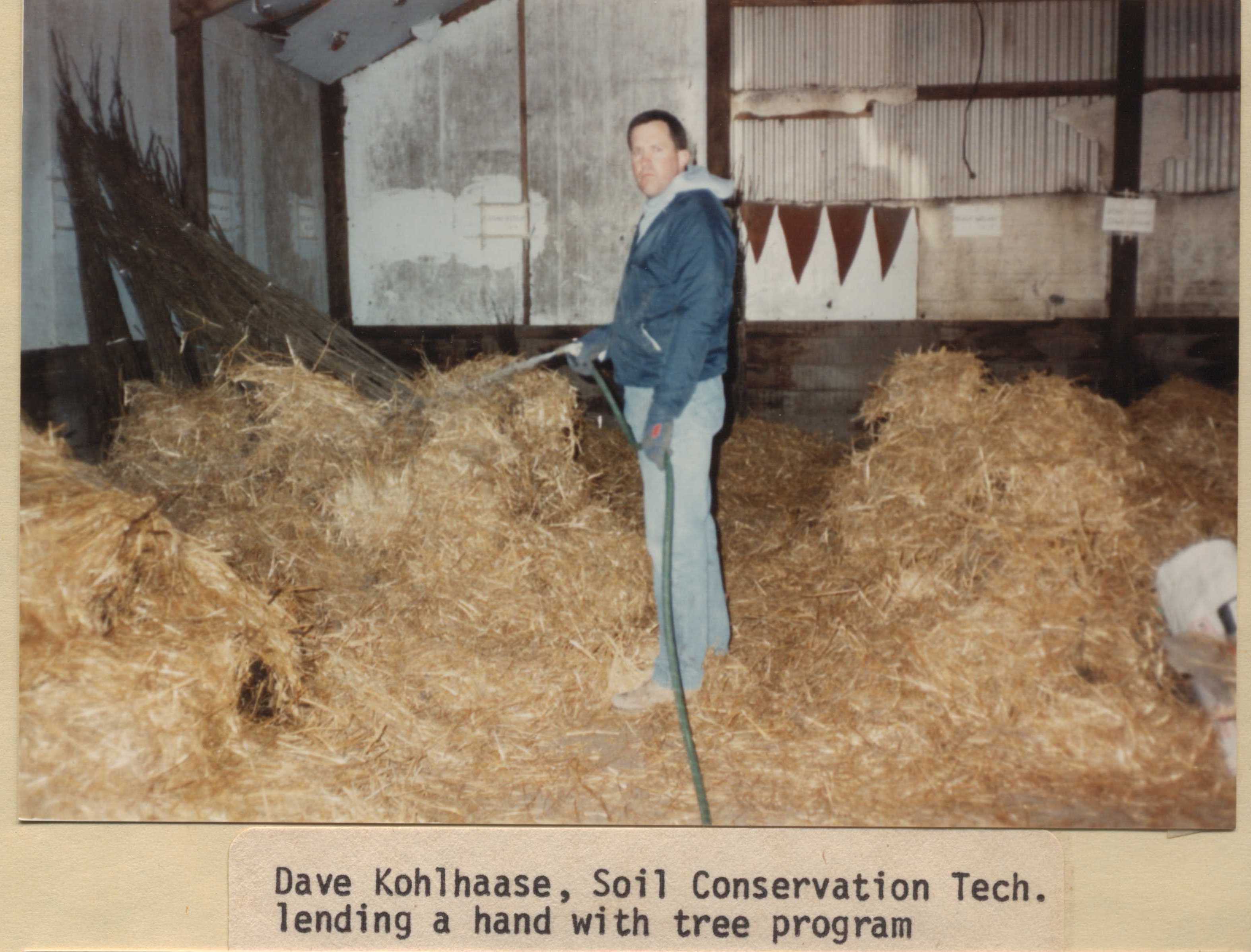 Dave Kohlhaase, Soil Conservation Technician, lending a hand with the tree program.