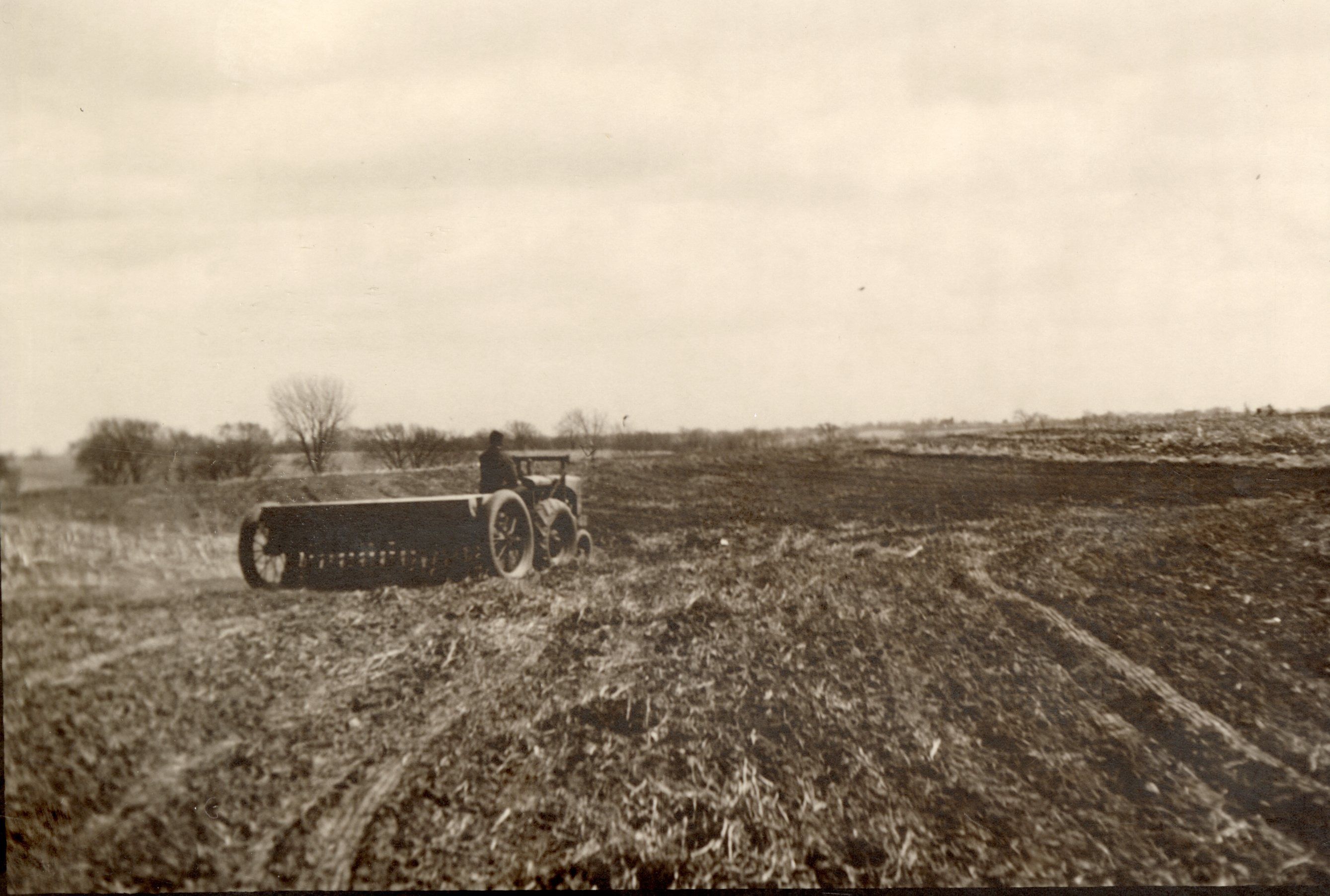 Tractor pulling grain drill