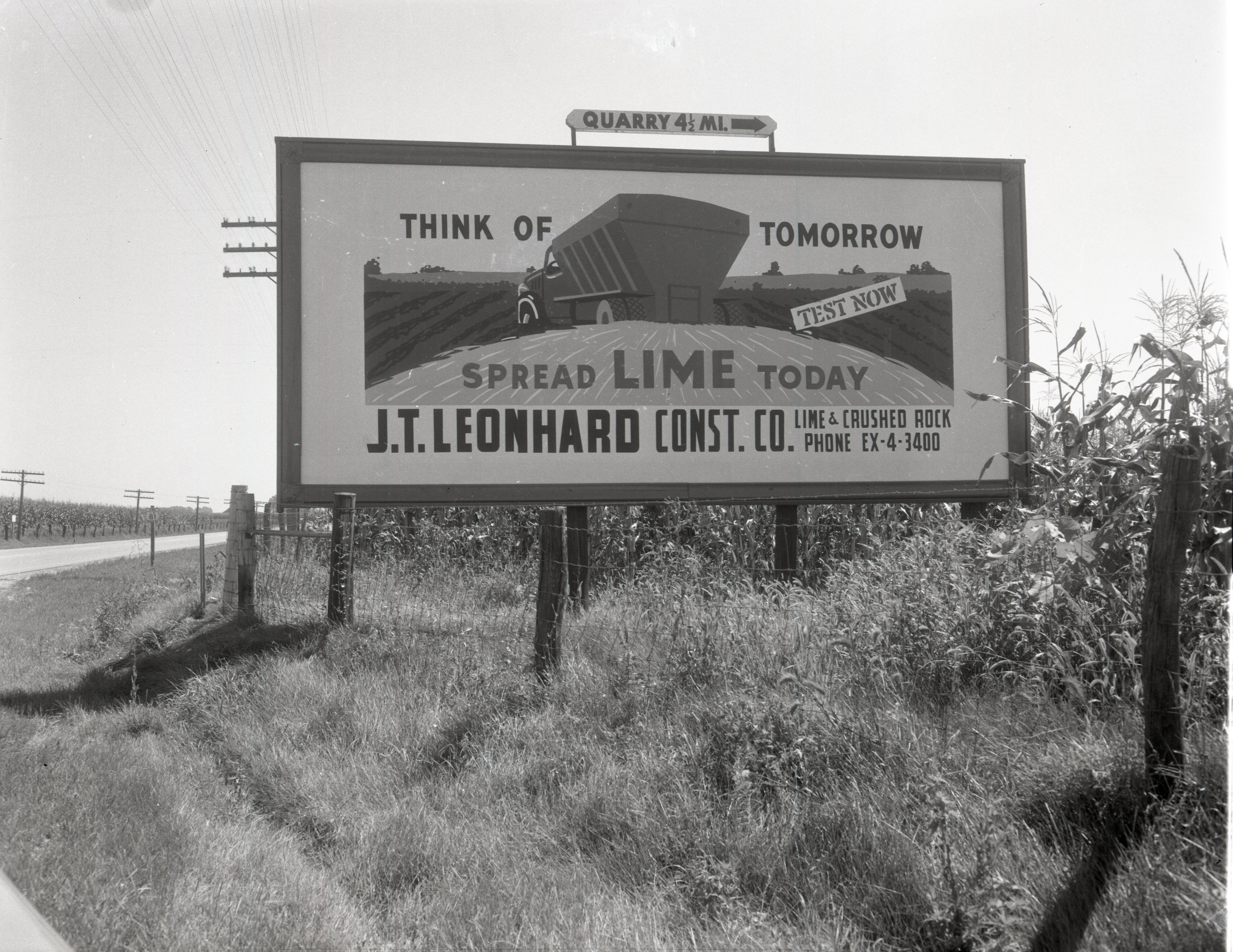 J.T. Leonard Construction Sign on Billboard by the side of the road