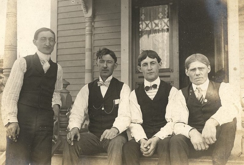 Four Men On Porch