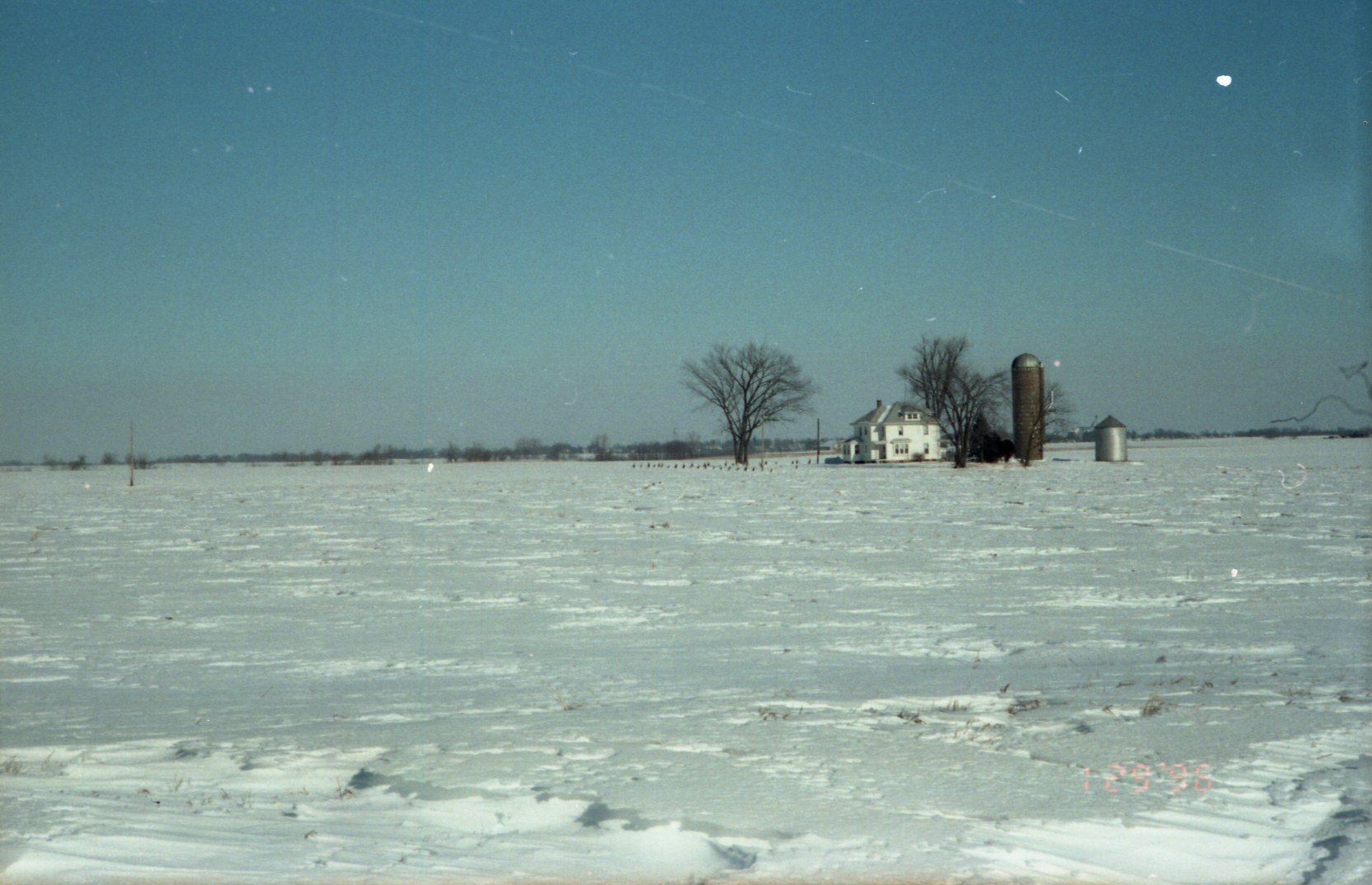 farmhouse in snow