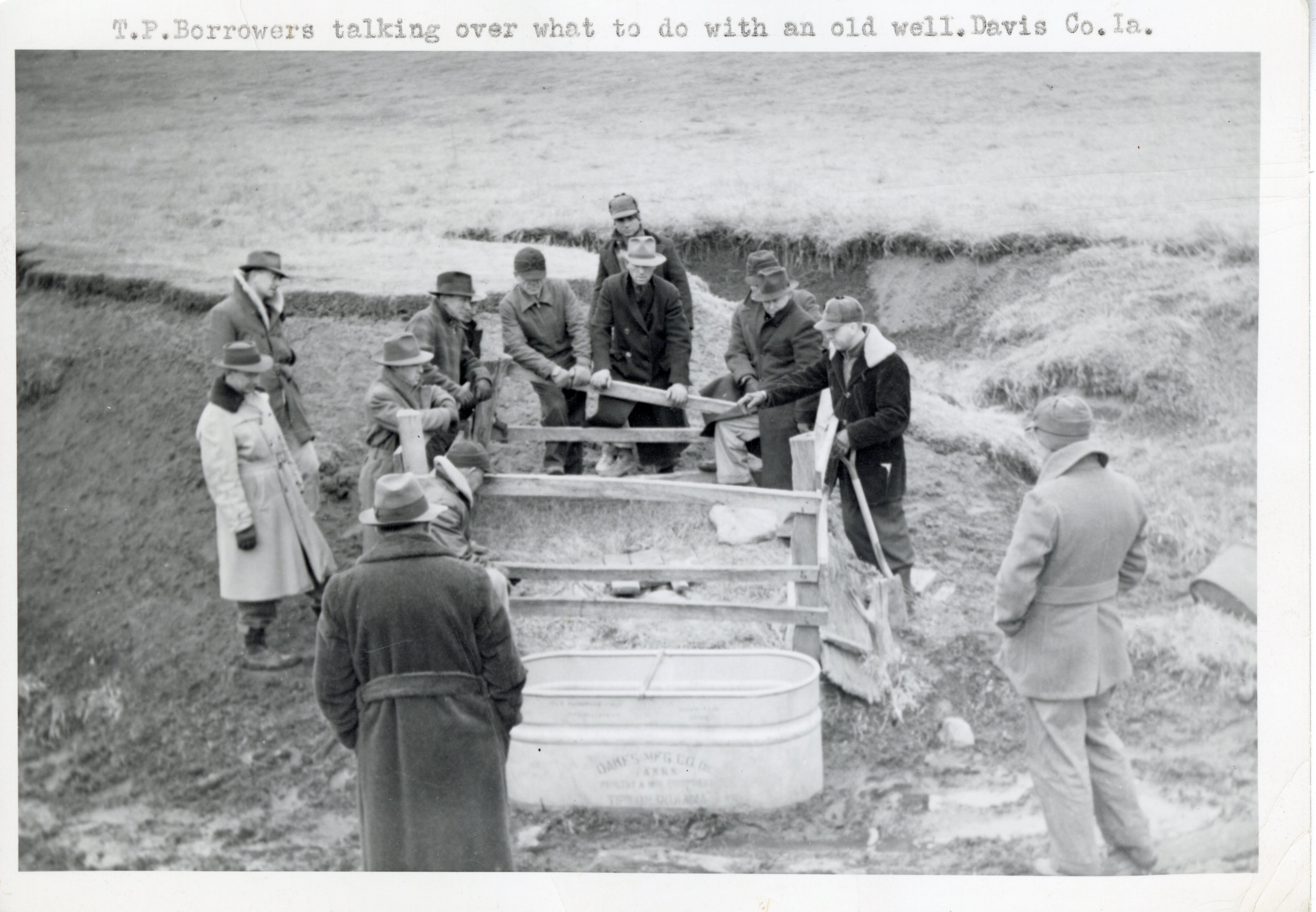 T.F. Borrowers Talking Over What to do with an Old Well in Davis County, Iowa