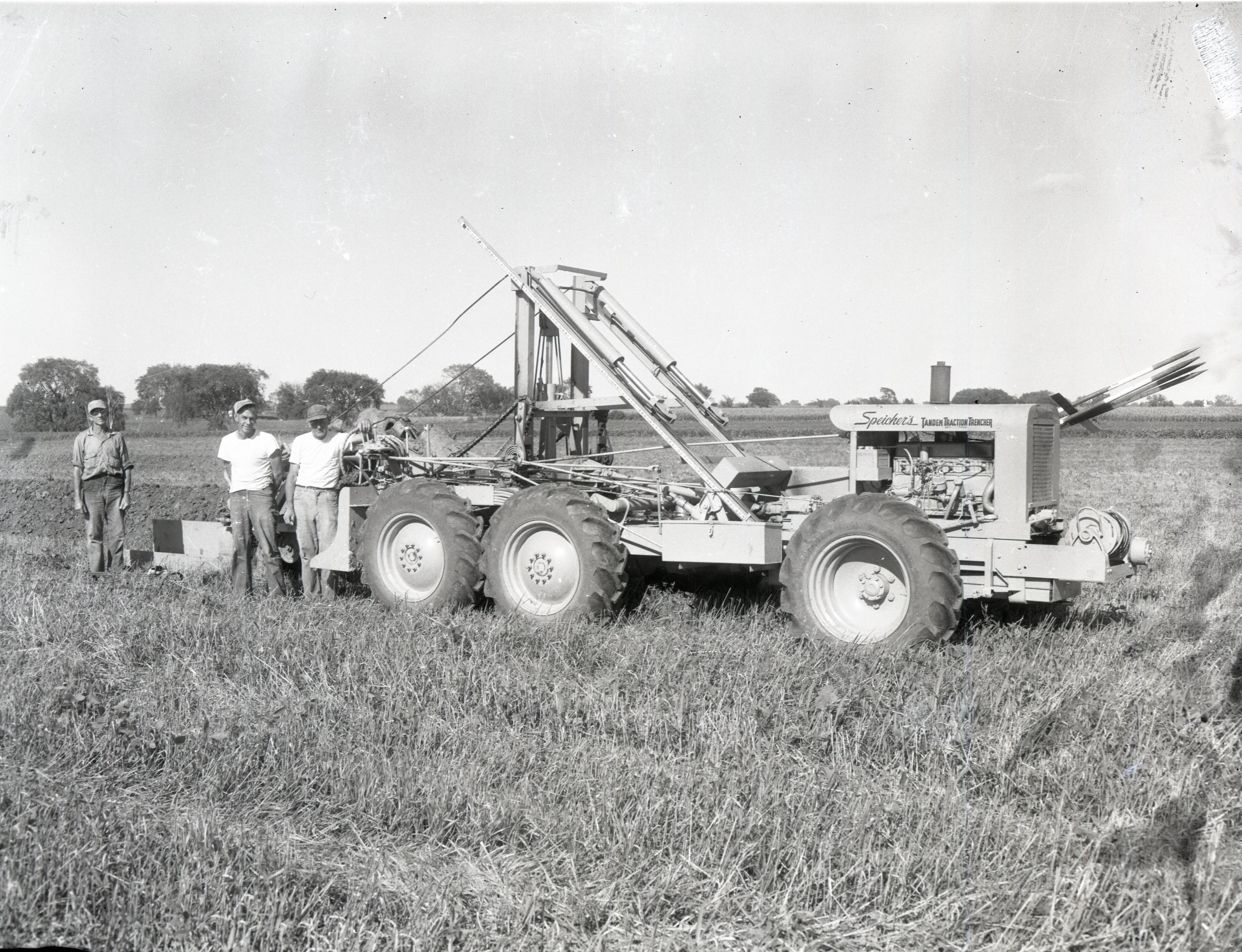 Nicholson Brothers stand by Spreichers Tandem Traction Trencher