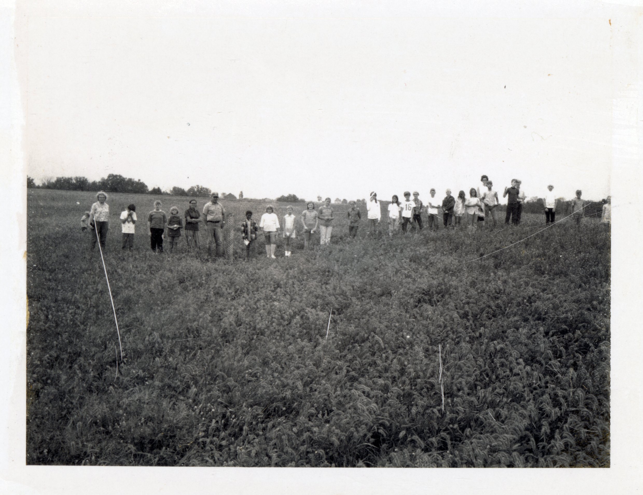 1970s Group of students stand in a field