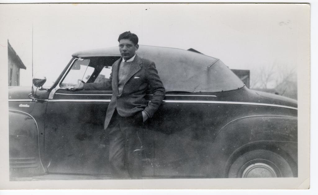 Hiram Ori with 1941 Plymouth Automobile