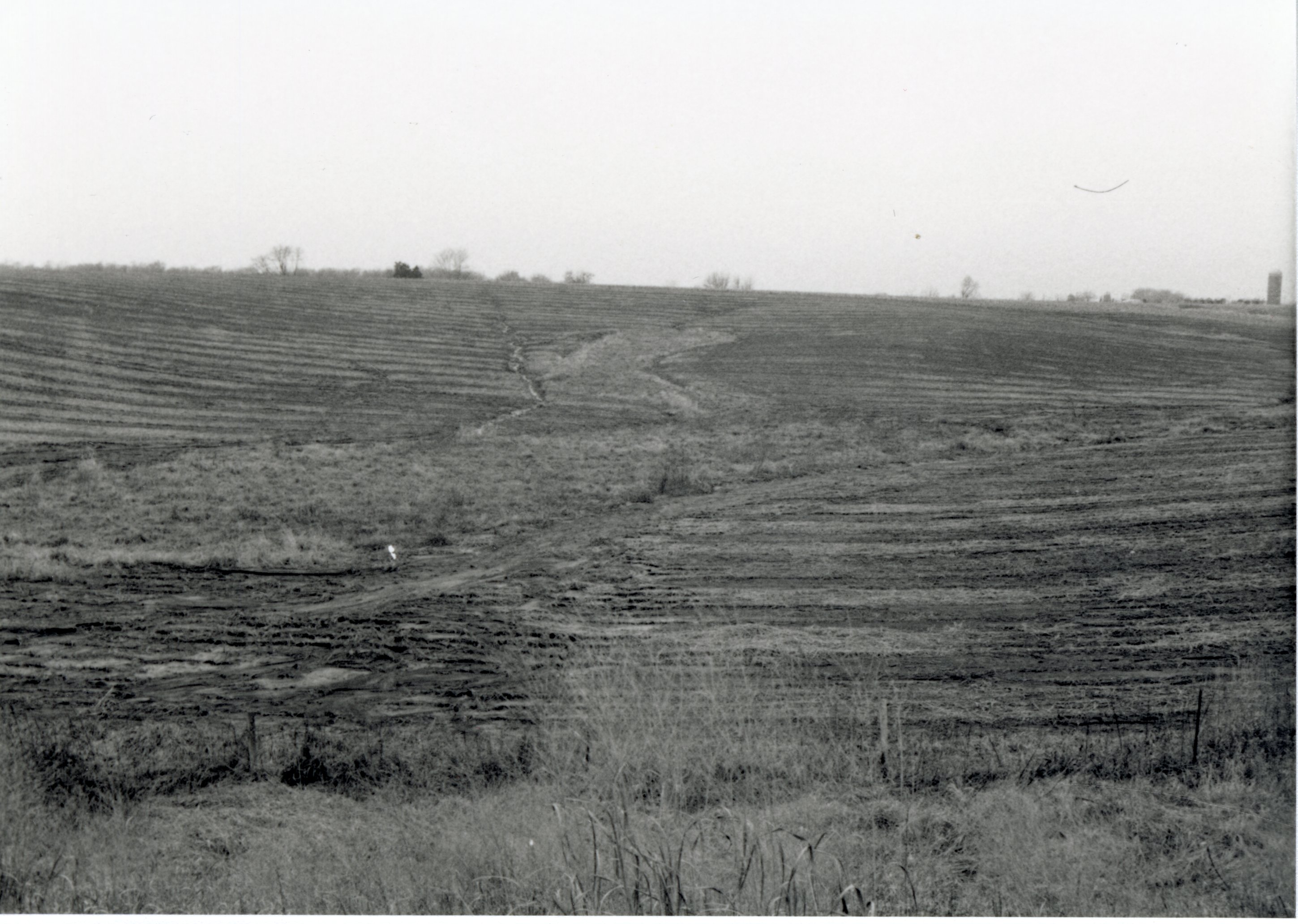 1970s Plowed fields with silo