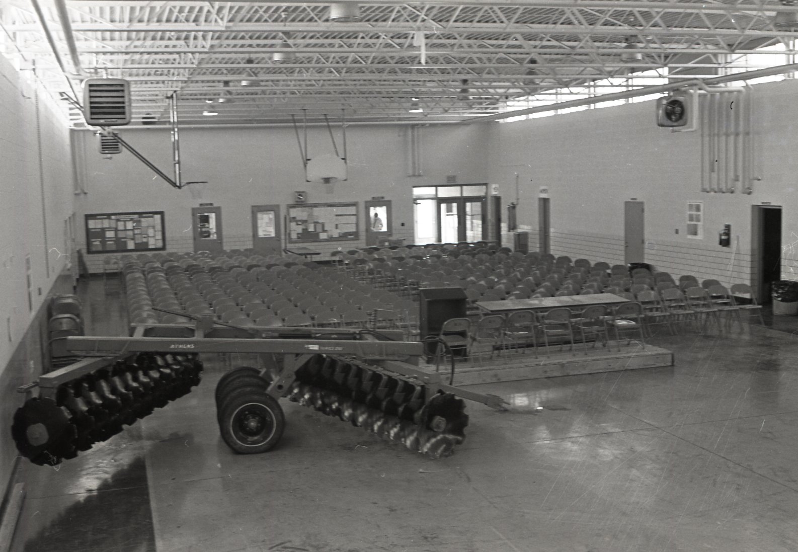 Room with chairs and agricultural equipment