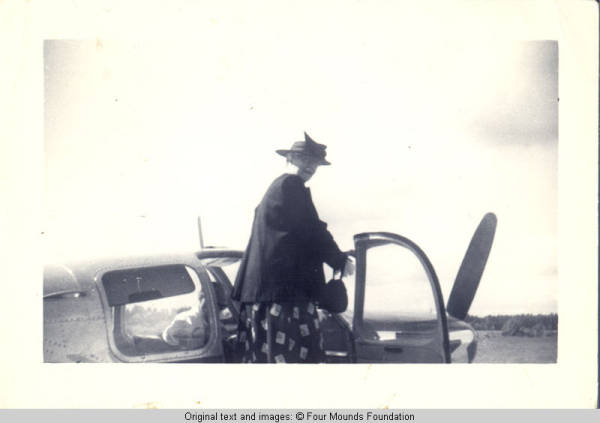 Viola Burden entering airplane