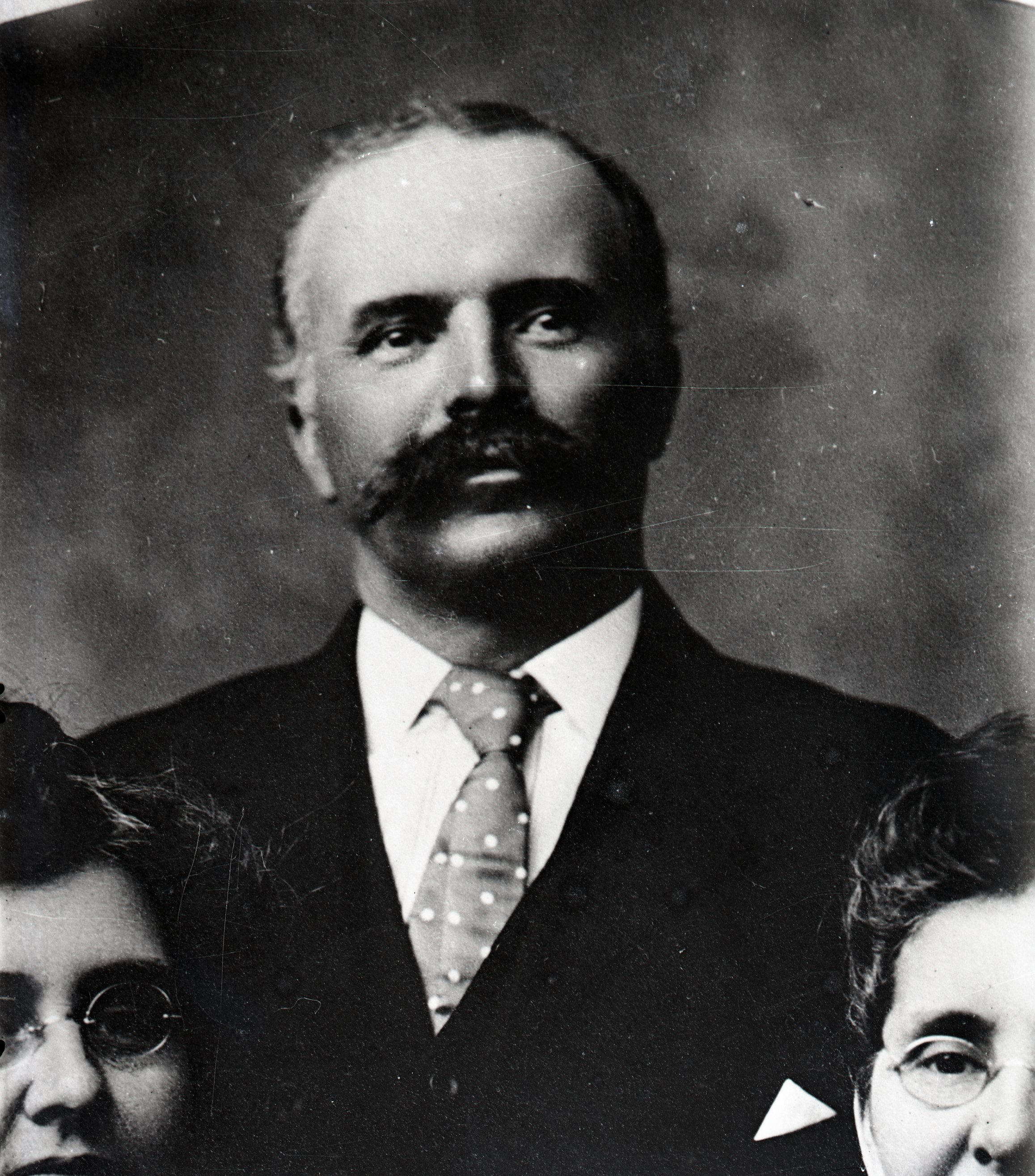 Man with two women