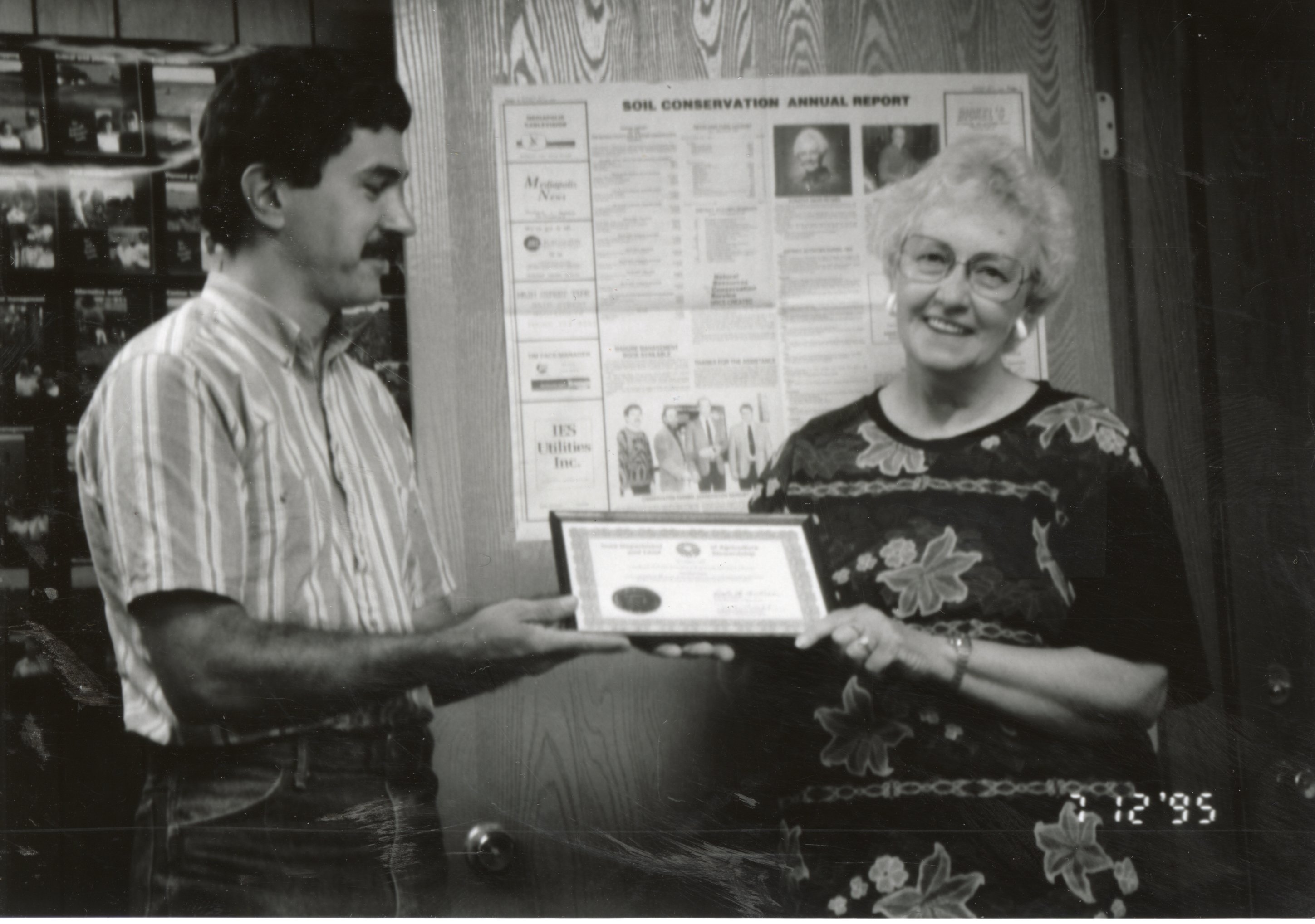 Mike Lewitke Presents Retirement Certificate to Dorothy Davis