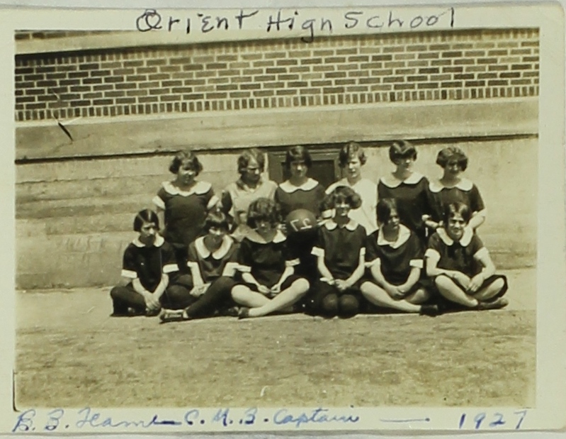Orient High School girls basketball team in front of building 1927