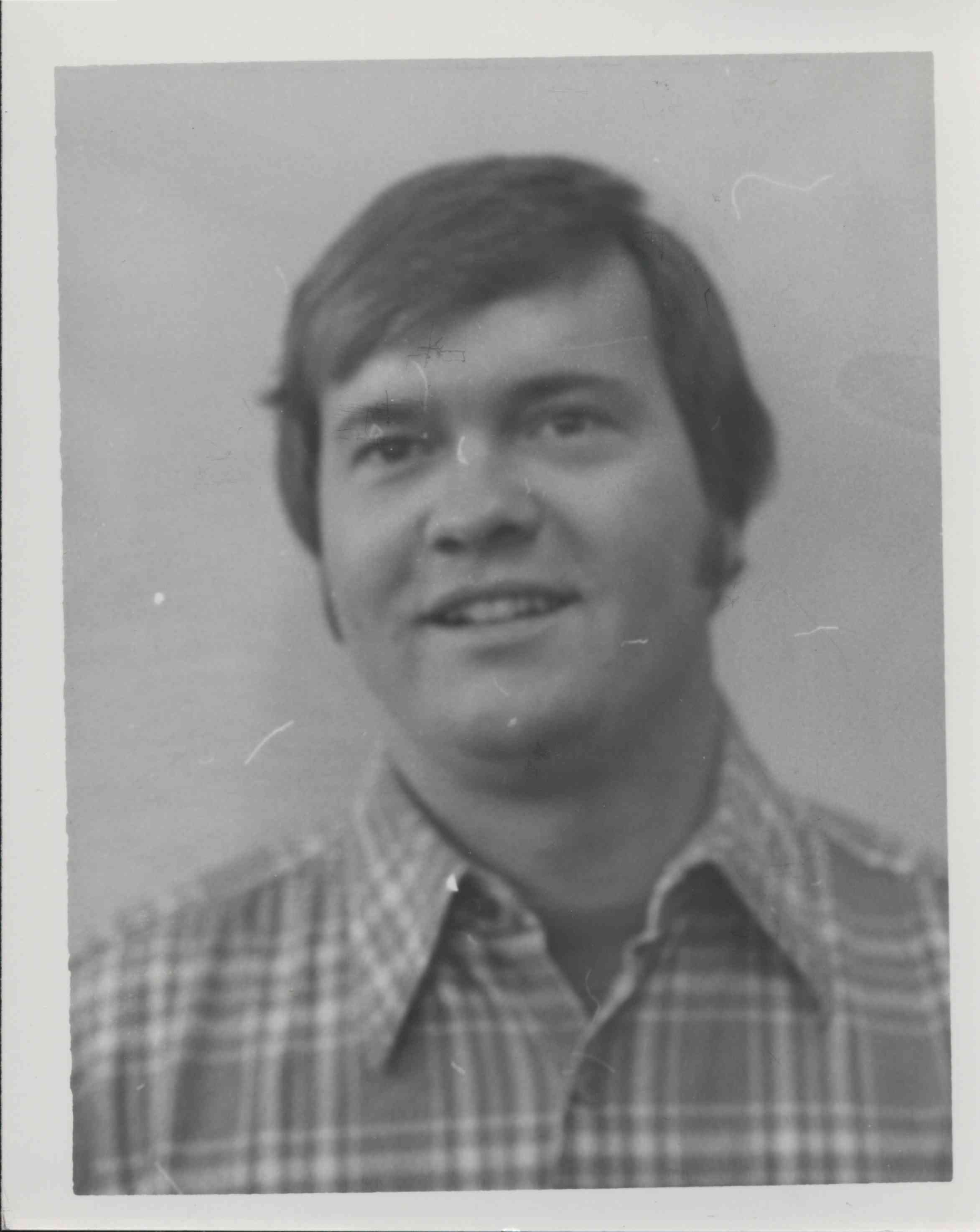 Unidentified Man in Plaid Shirt